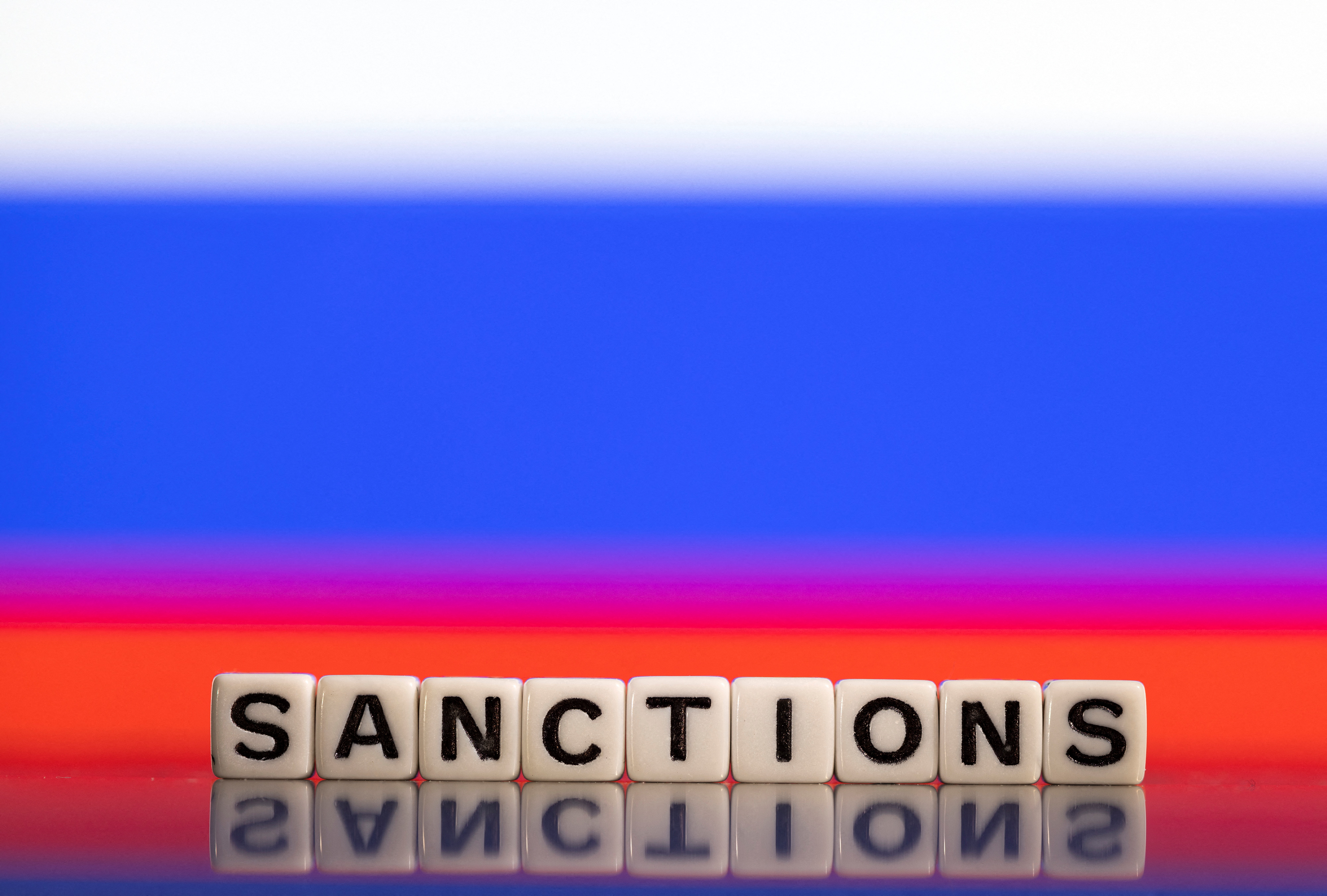 "Sanctions" in front of Russian flag colors