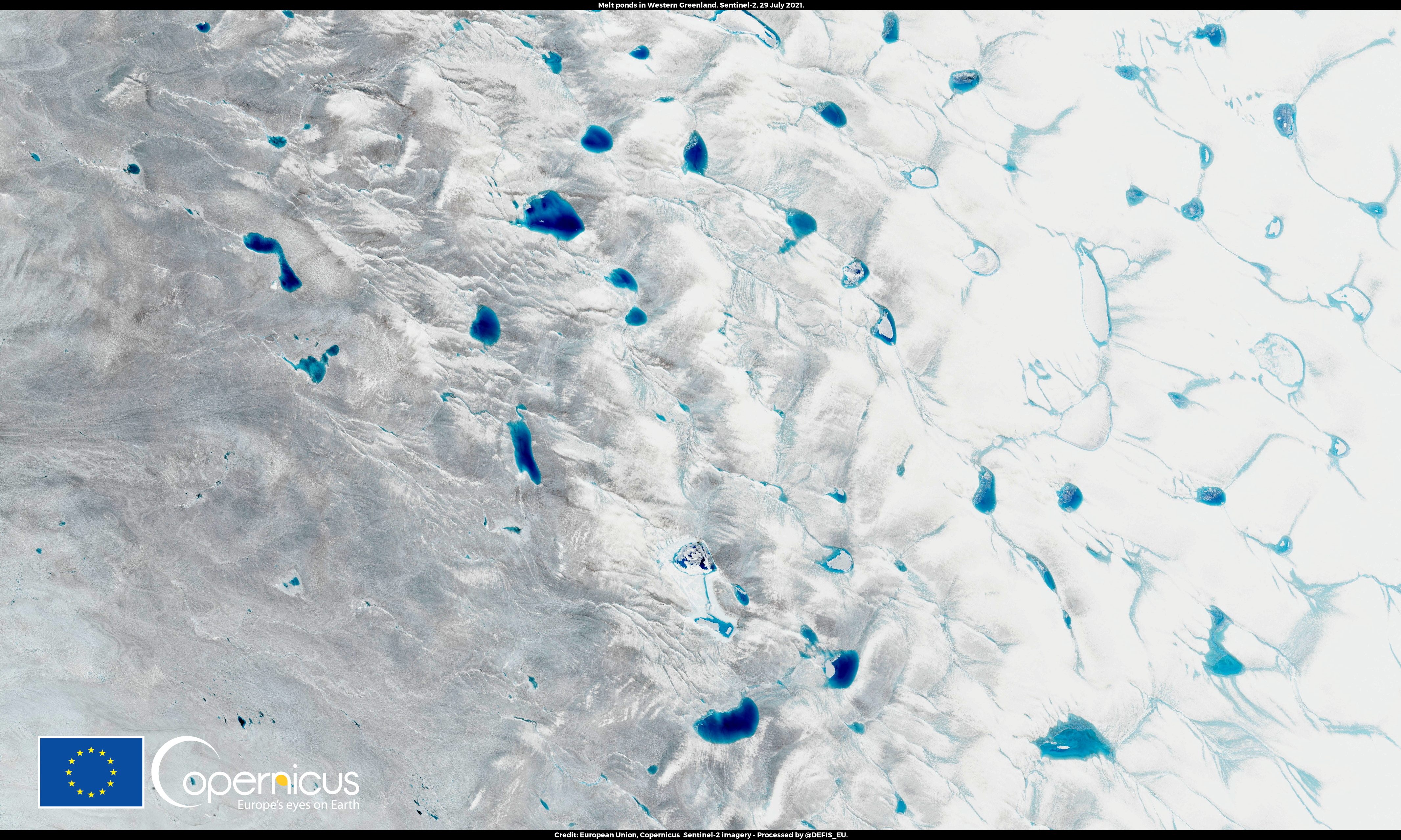 This image, acquired by one of the Copernicus Sentinel-2 satellites, shows melt ponds 90km Southeast of Kangerlussuaq Fjord, Greenland July 29, 2021. Picture taken July 29, 2021. European Union, Copernicus Sentinel-2 imagery - Processed by @DEFIS_EU/Handout via REUTERS    