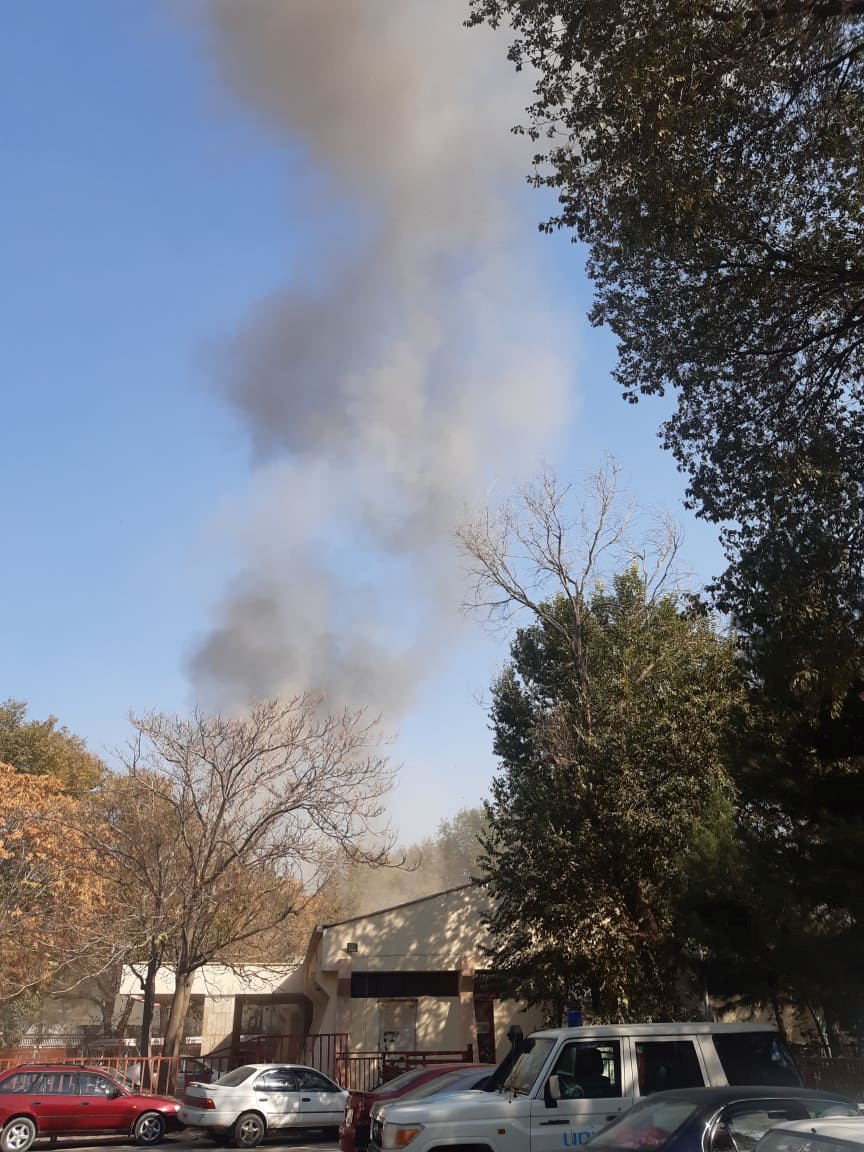 Smoke billows near military hospital after an explosion in Kabul