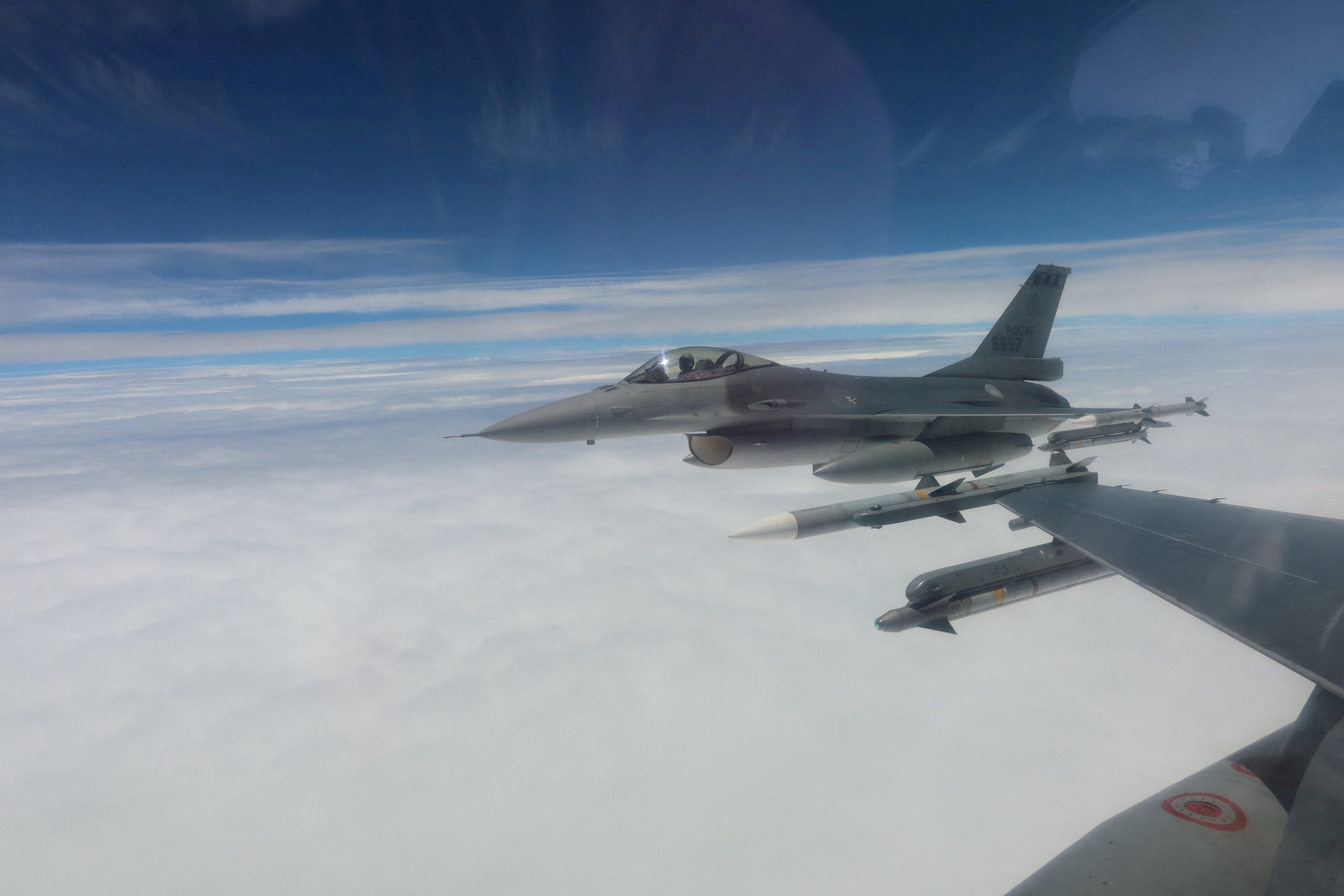 Taiwan Air Force F-16 aircrafts fly during a patrolling mission at an undisclosed location in Taiwan
