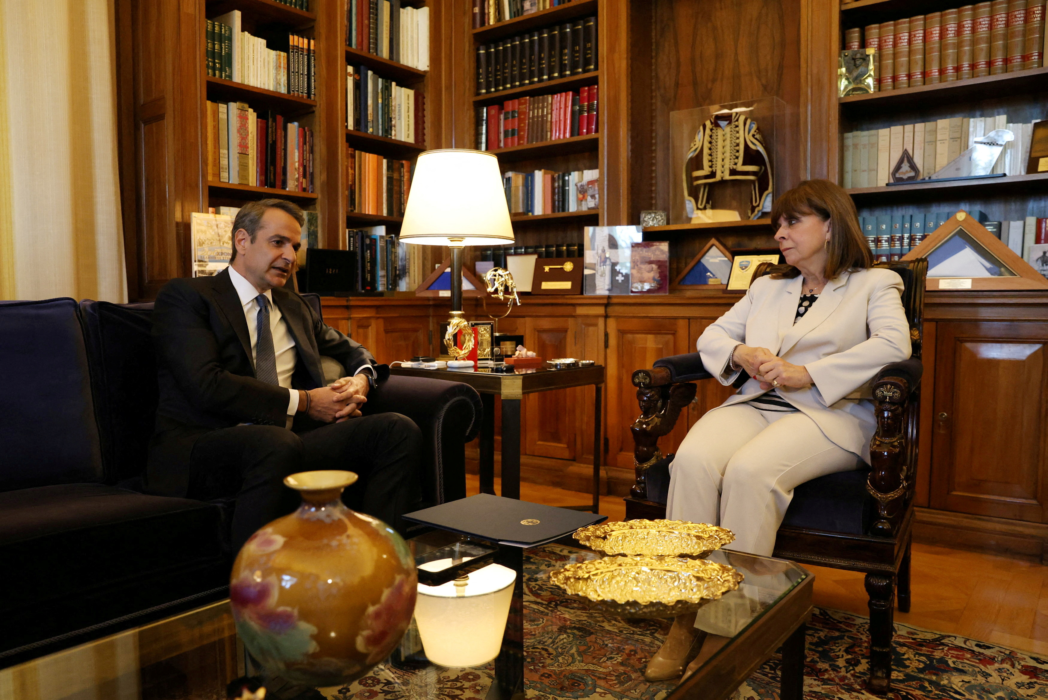 Greek Prime Minister Kyriakos Mitsotakis meets with Greek President Katerina Sakellaropoulou to discuss snap elections at the Presidential Palace in Athens