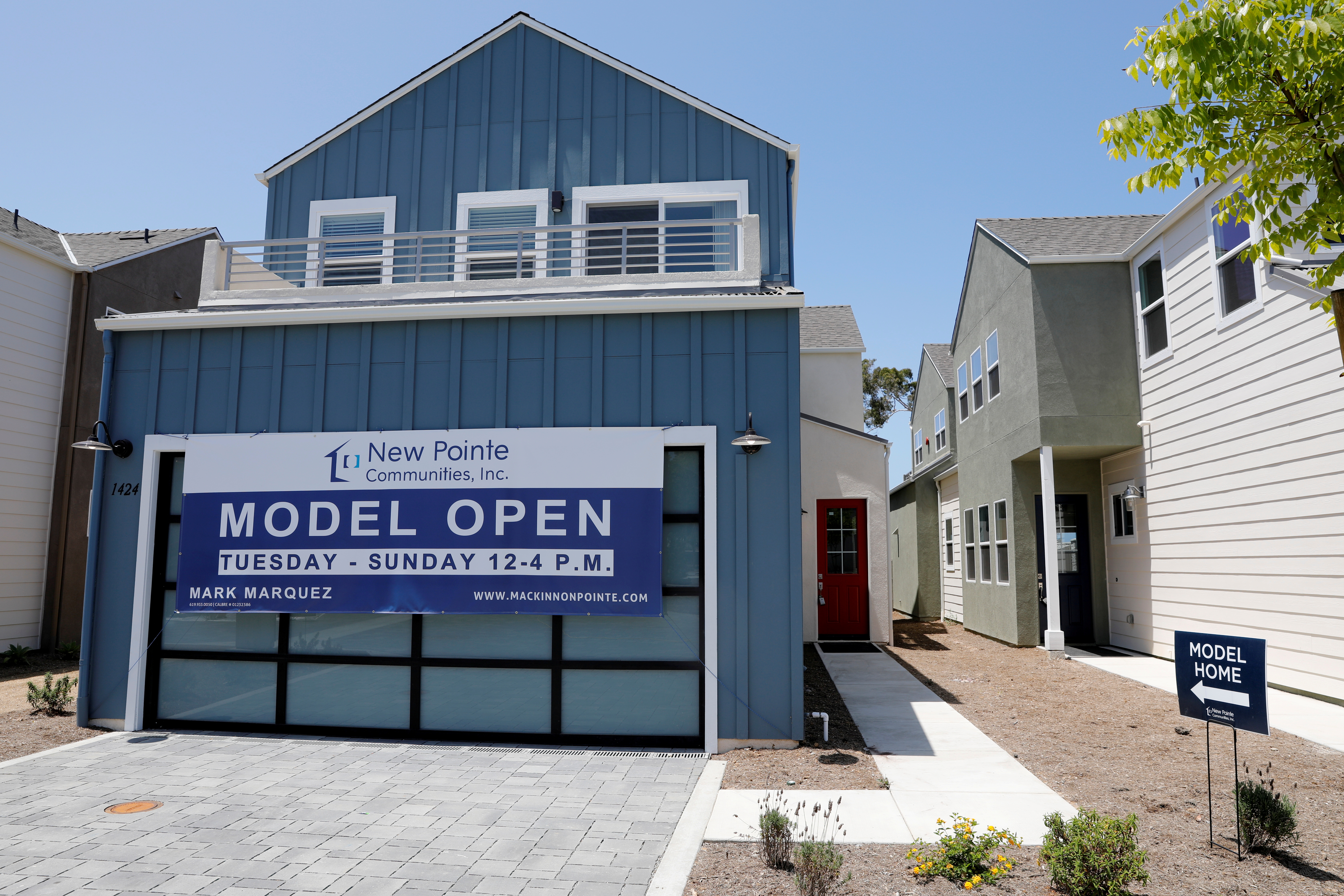 Newly constructed single family homes are shown for sale in Encinitas, California
