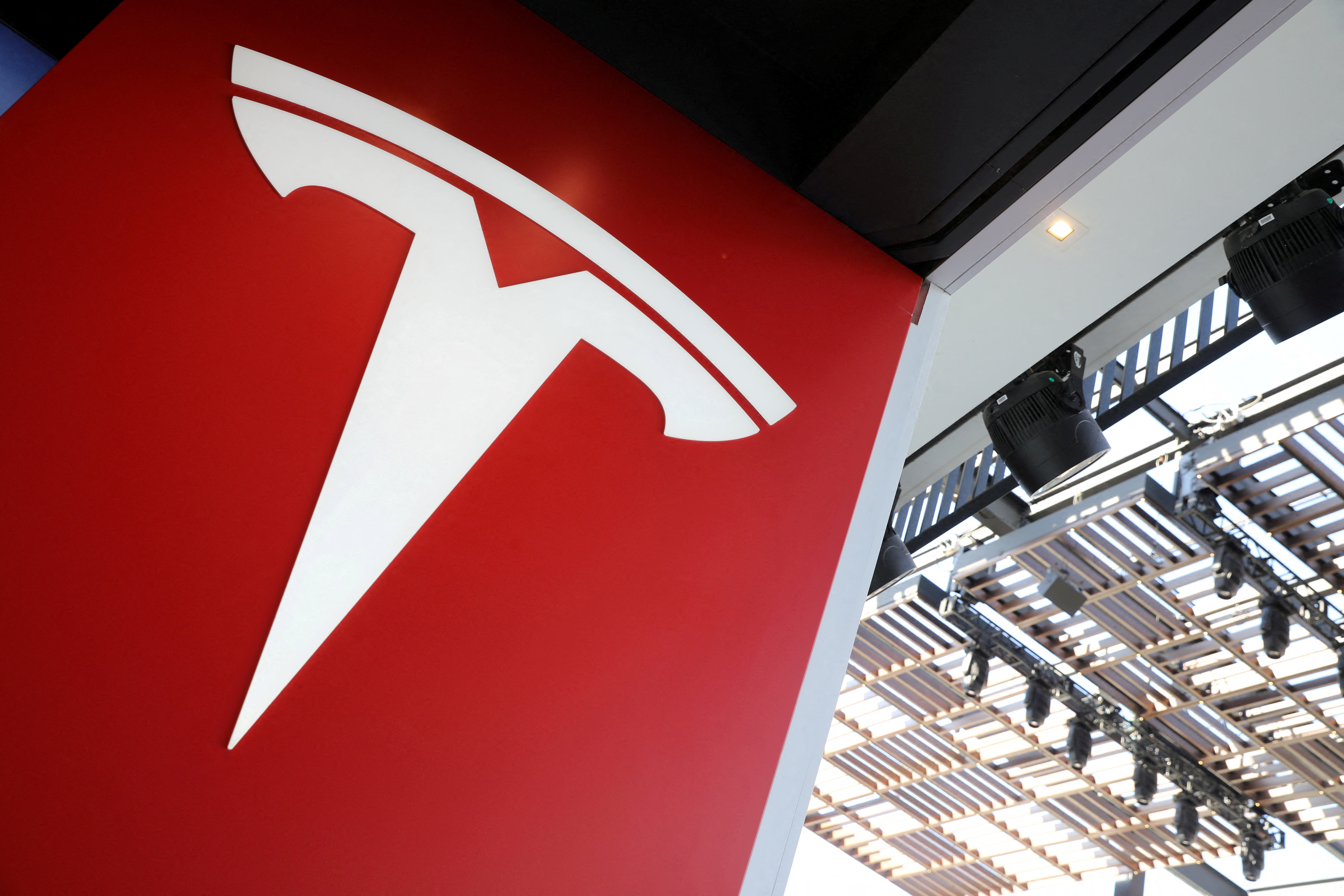 FILE PHOTO: A Tesla logo is seen in Los Angeles