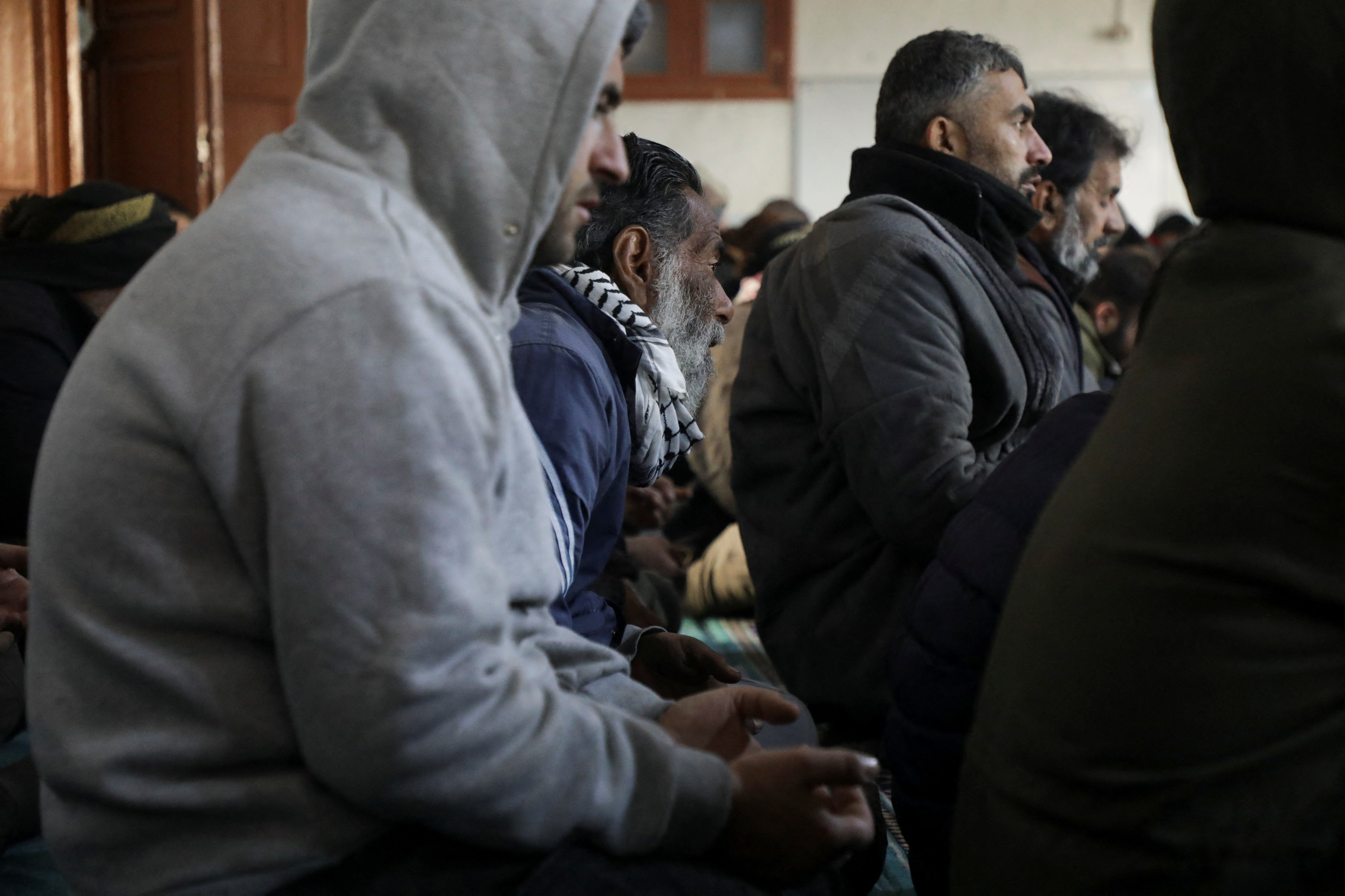 People pray inside a mosque in rebel-held town of Jandaris