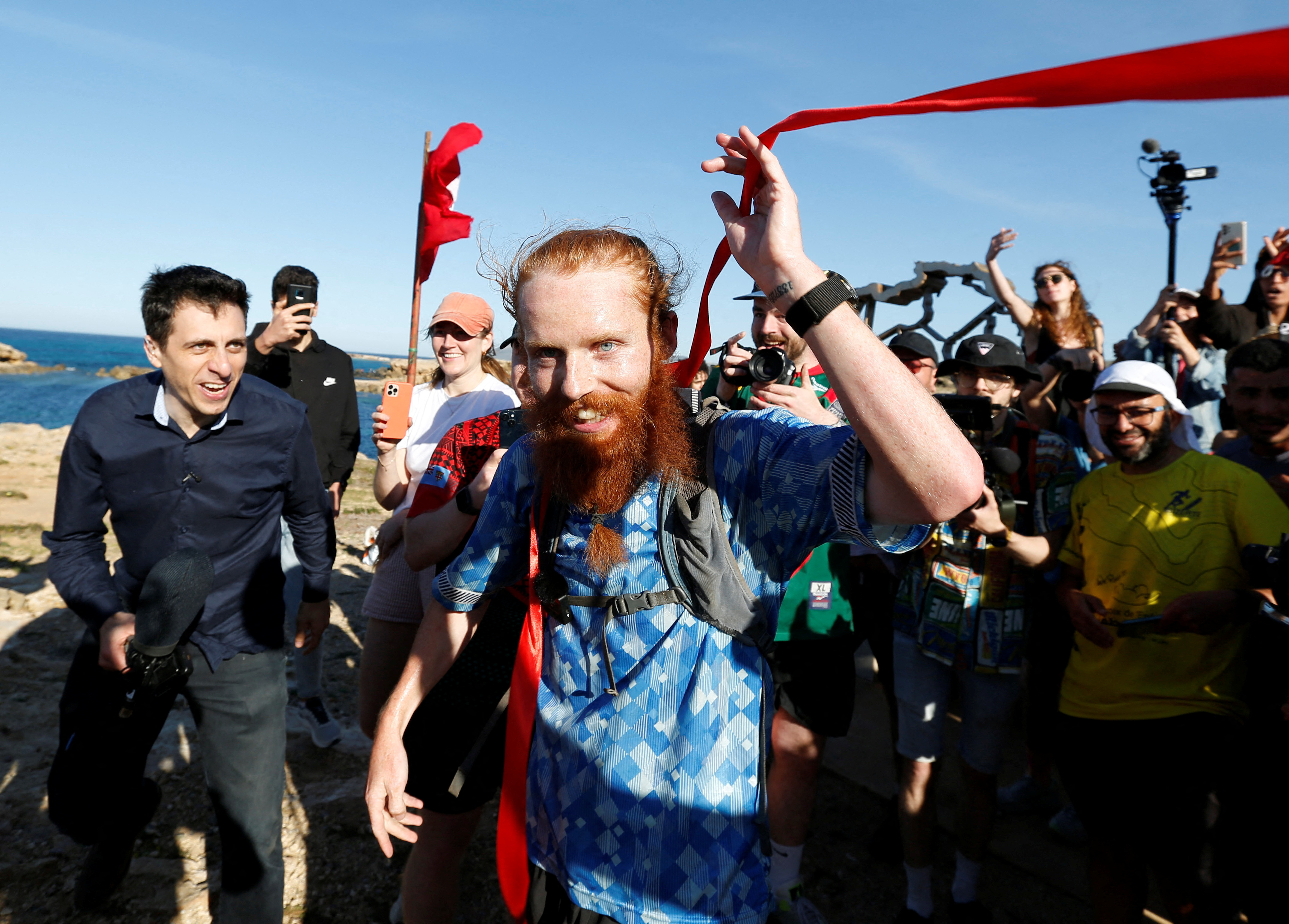 Britain's Russ Cook becomes the first person to run the entire length of Africa