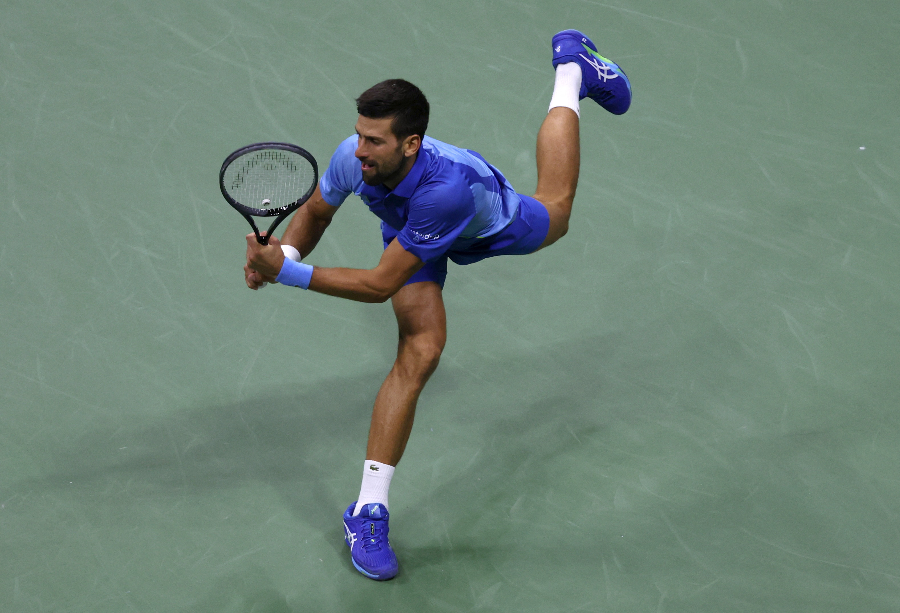 Djokovic fights back from two sets down to reach U.S