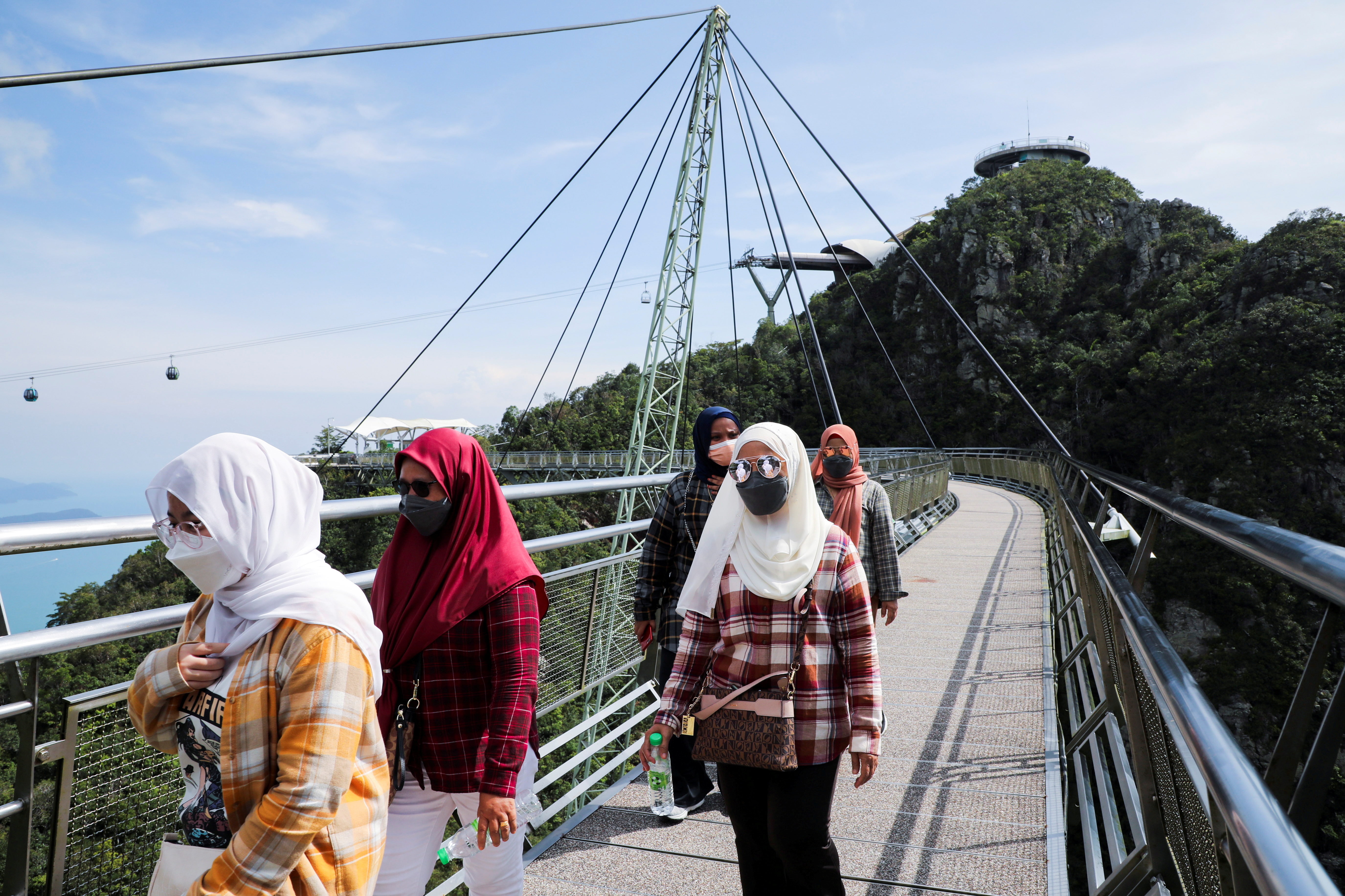 Tourists visit the Sky Bridge as it reopens to domestic tourists amid the coronavirus disease (COVID-19) pandemic in Langkawi