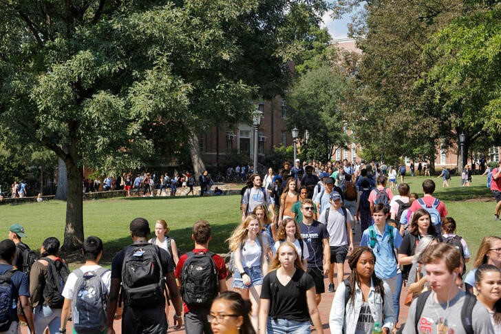 Students walk through the campus of the University of North Carolina at Chapel Hill North Carolina