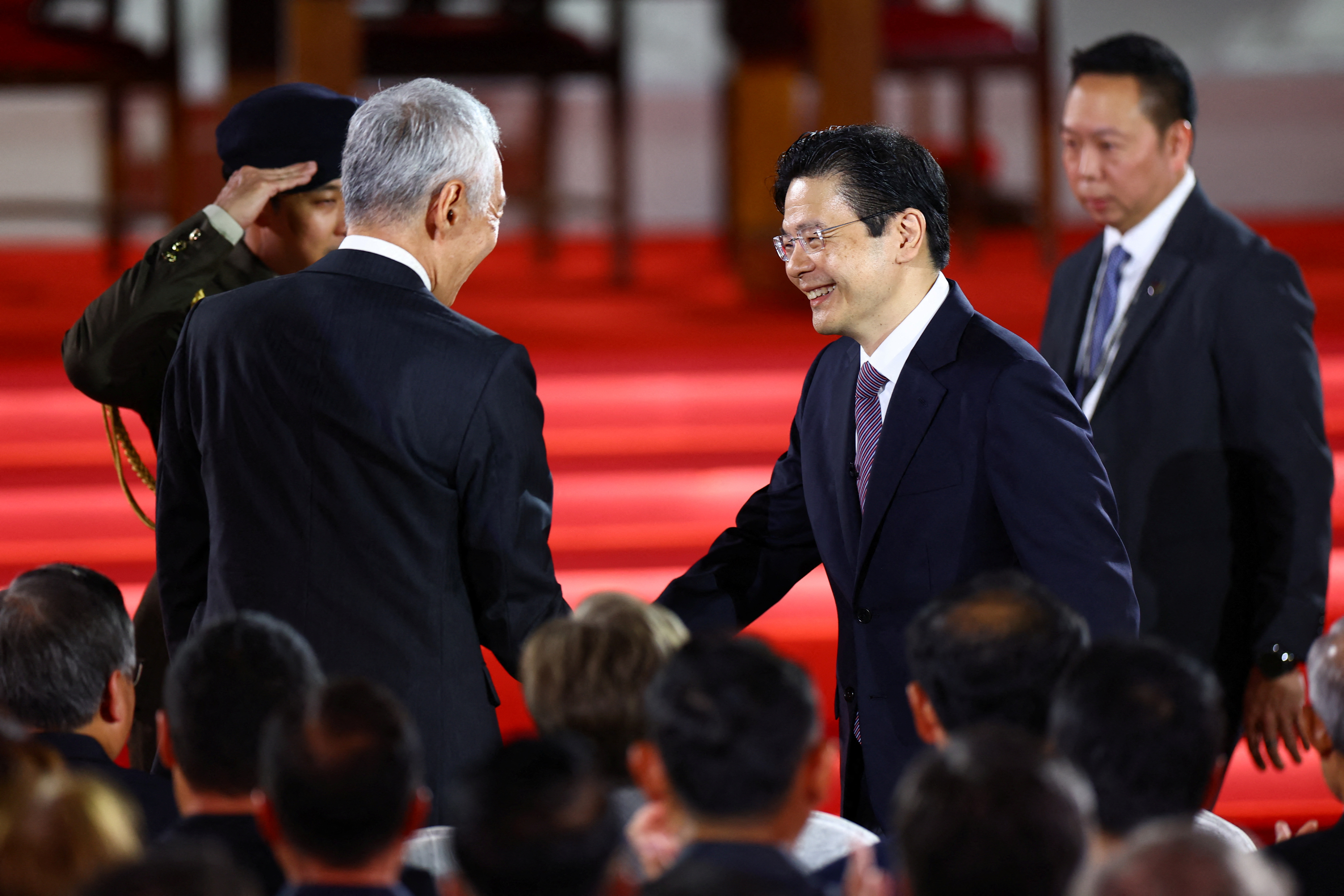 Singapore's Deputy Prime Minister and Minister of Finance Lawrence Wong is sworn in as Singapore's fourth Prime Minister