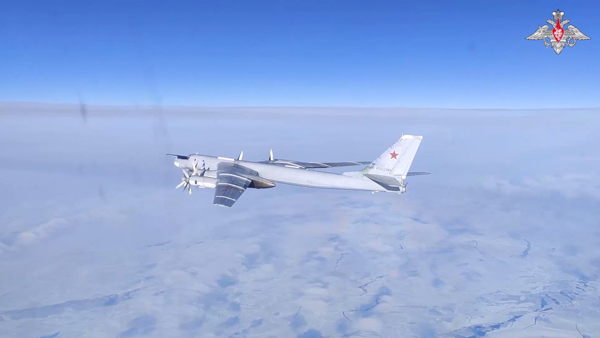 Russian Tu-95MS strategic bomber performs a flight over the neutral waters of the Bering Sea