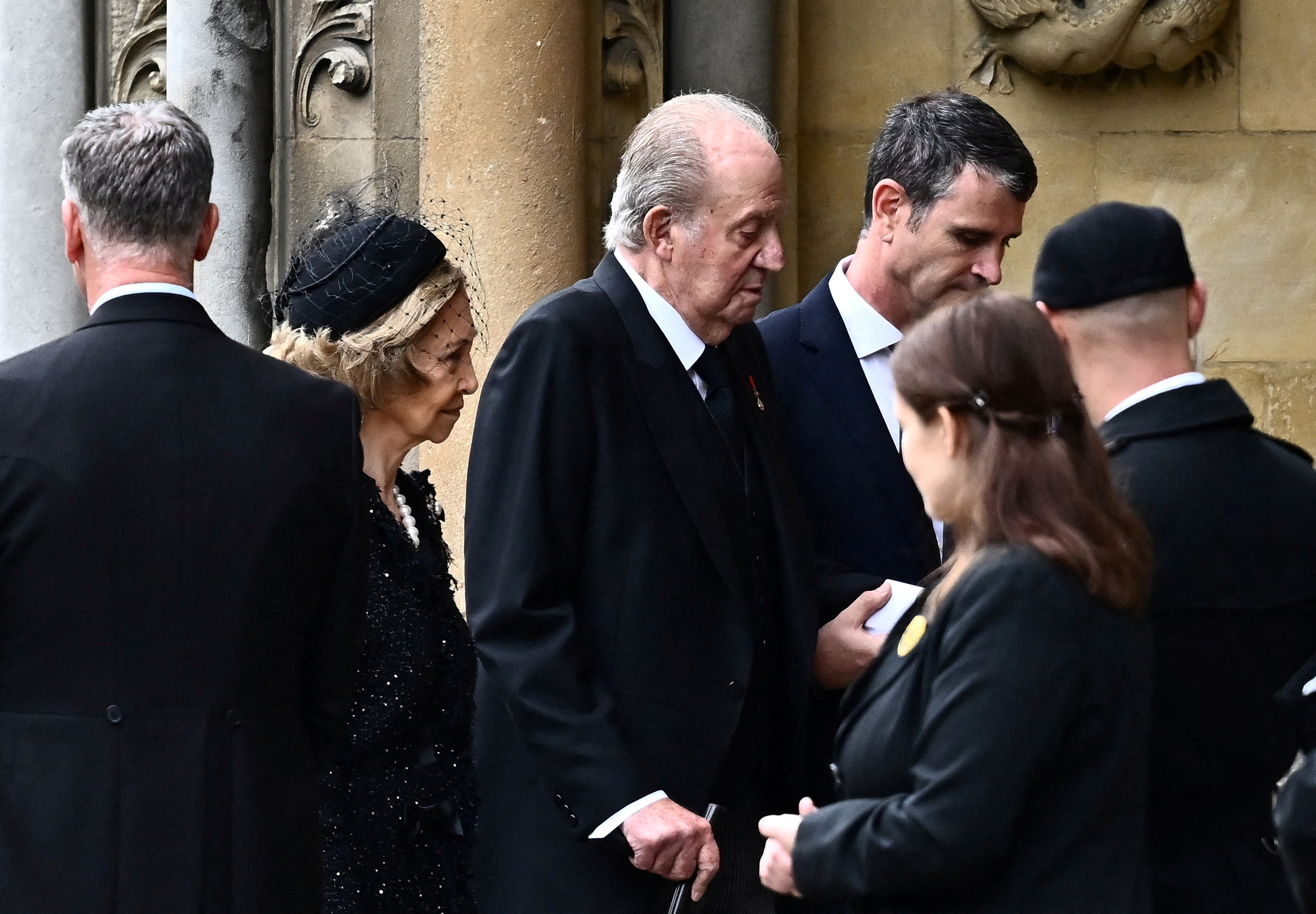 ExKing Juan Carlos' attendance at queen's funeral draws scorn from