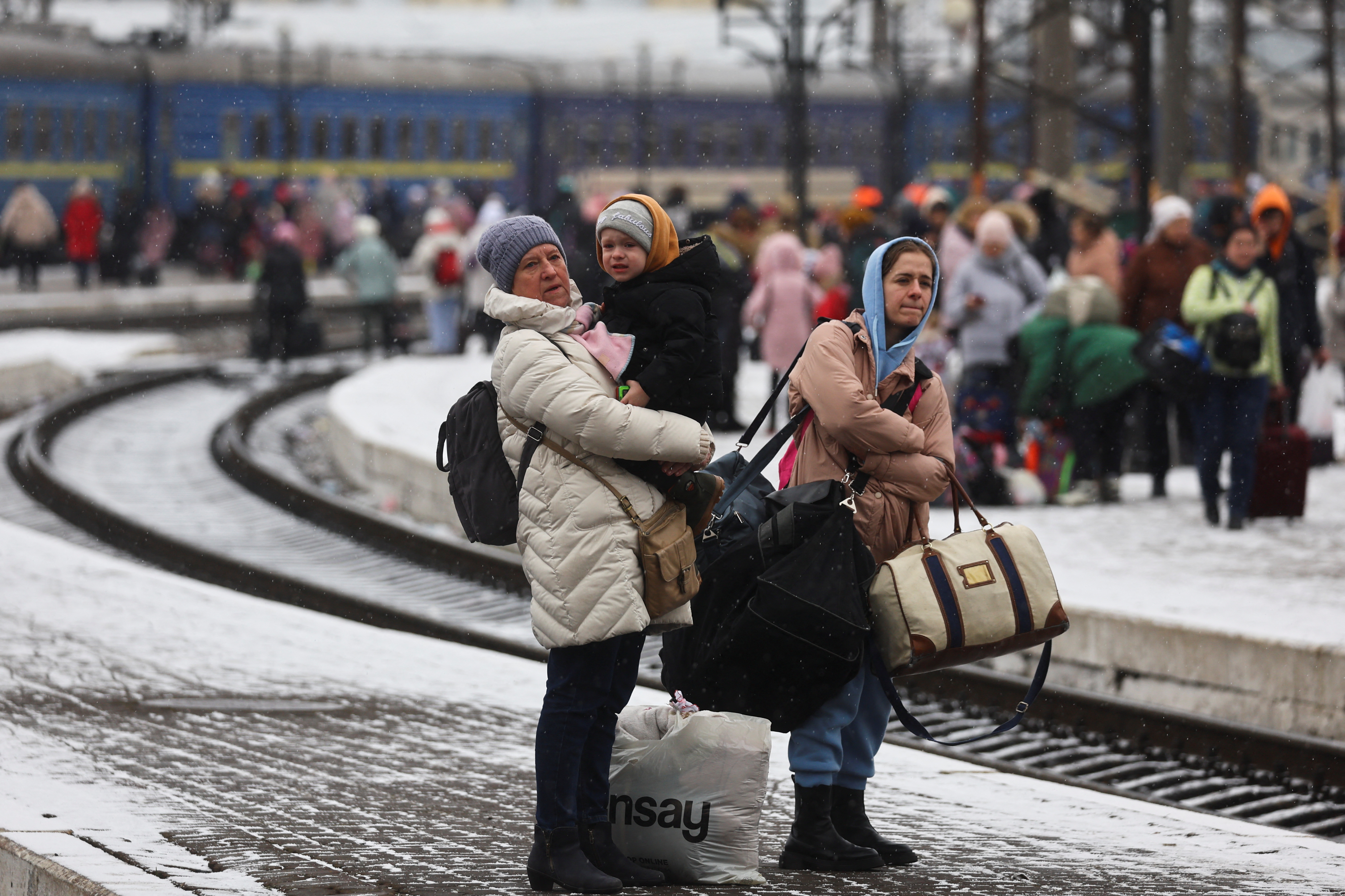 Refugees flee Russia's invasion of Ukraine, in Lviv