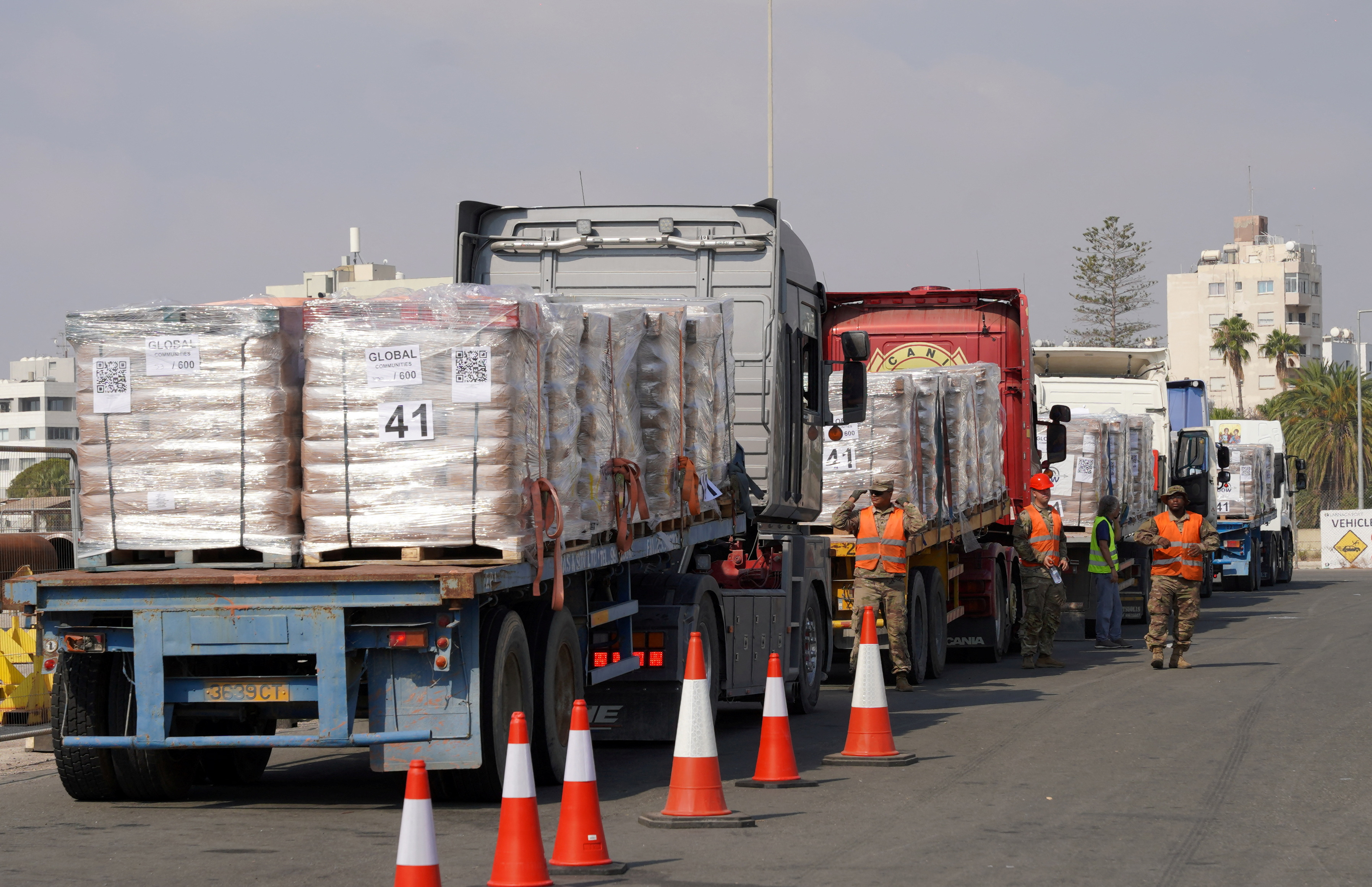 Lorries with aid loads for delivery into Gaza arrive at Larnaca Port