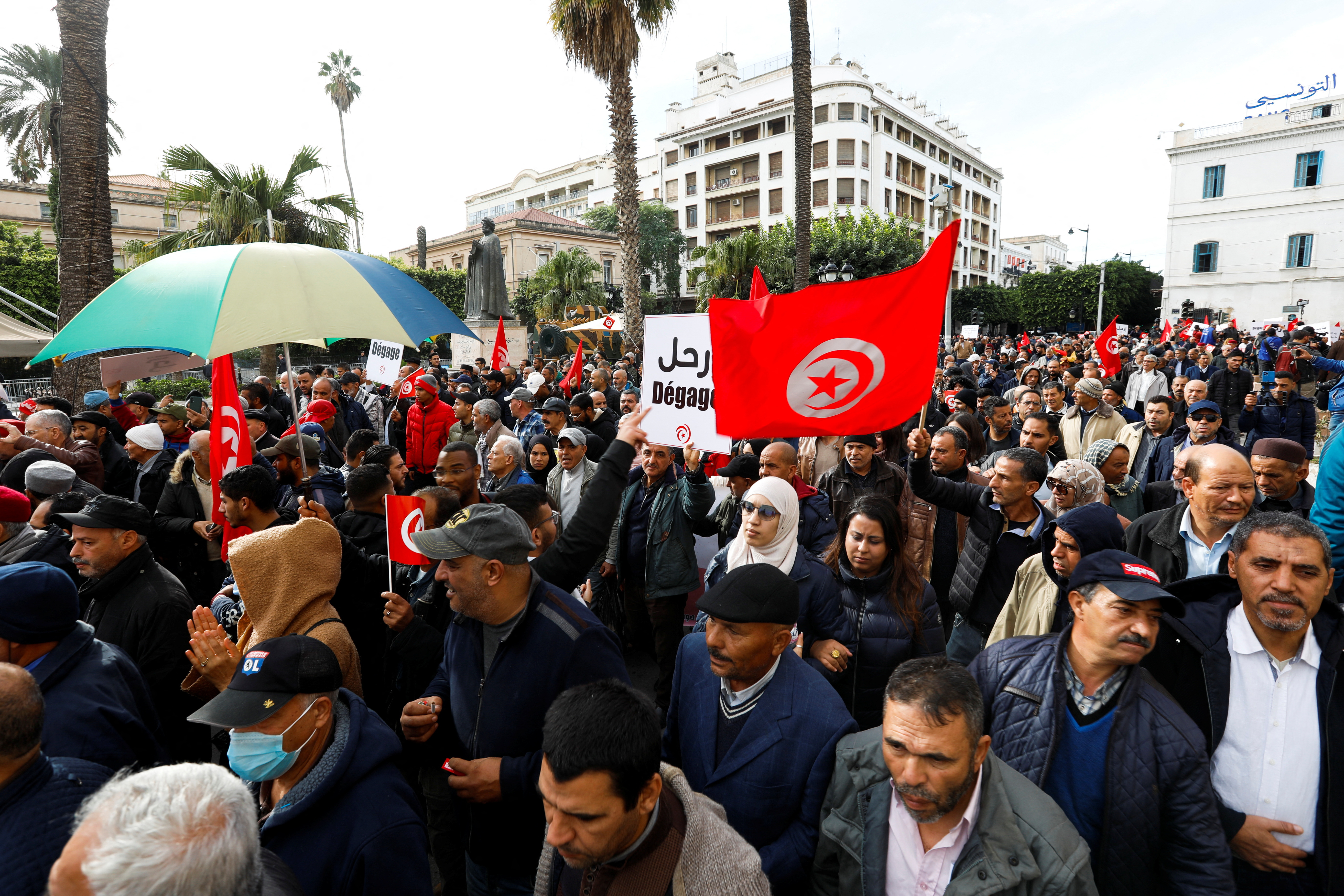 Supporters of Tunisian opposition groups protest against the upcoming parliamentary election in Tunis