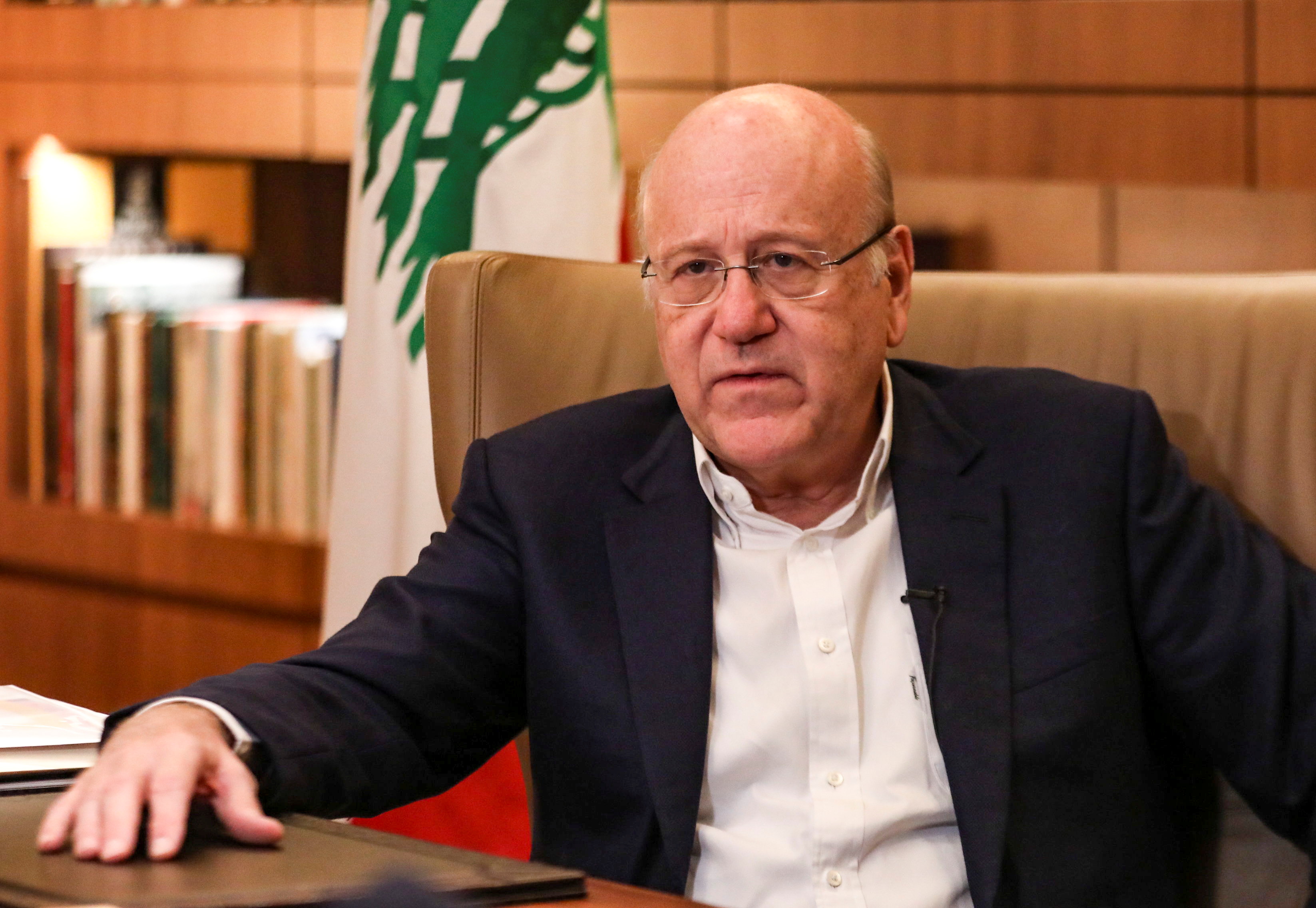 Lebanese Prime Minister Najib Mikati speaks during an interview with Reuters at the government palace in Beirut