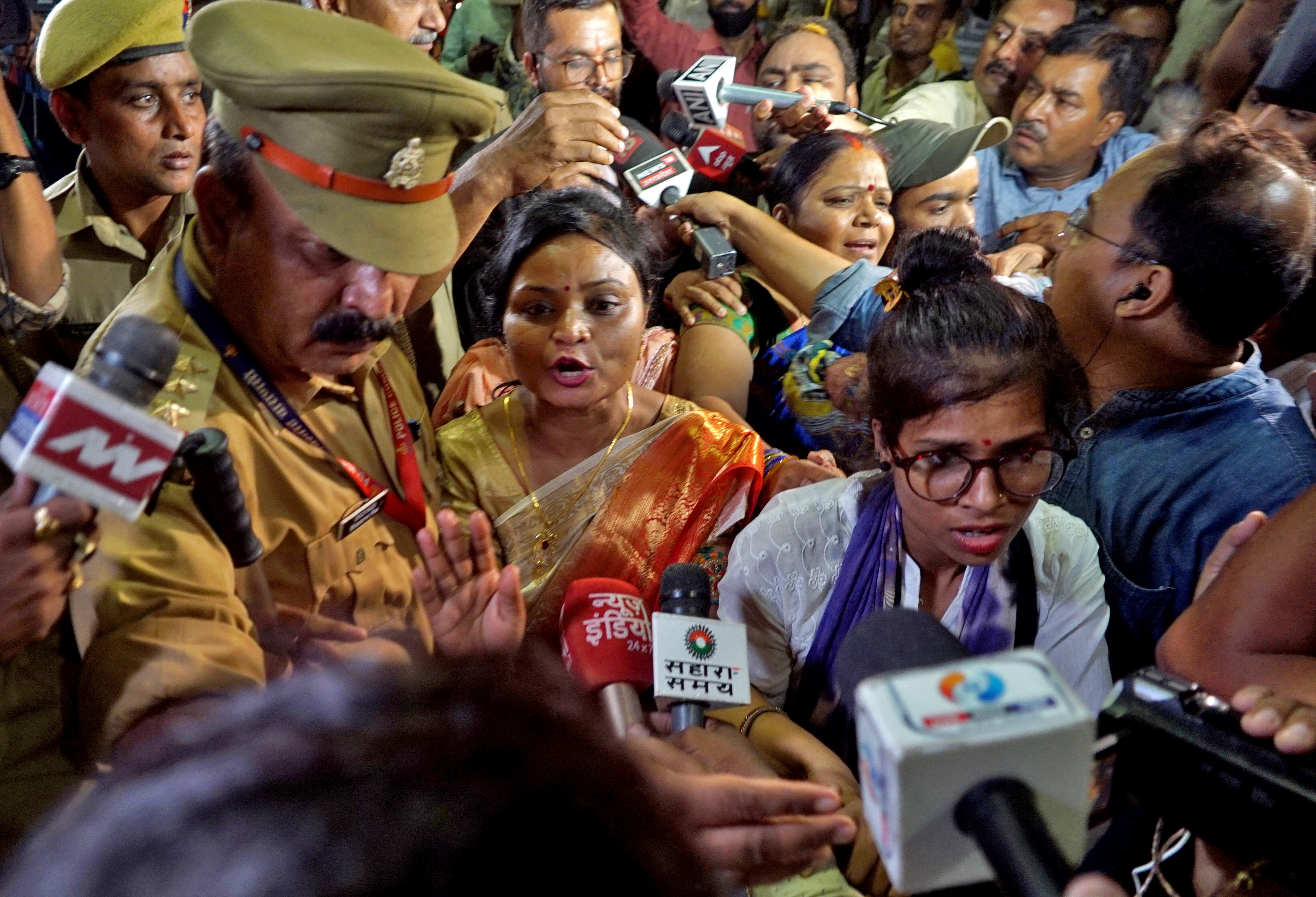 Rakhi Singh, Sita Sahu and Laxmi Devi speak with the media after they leave the mosque in Varanasi