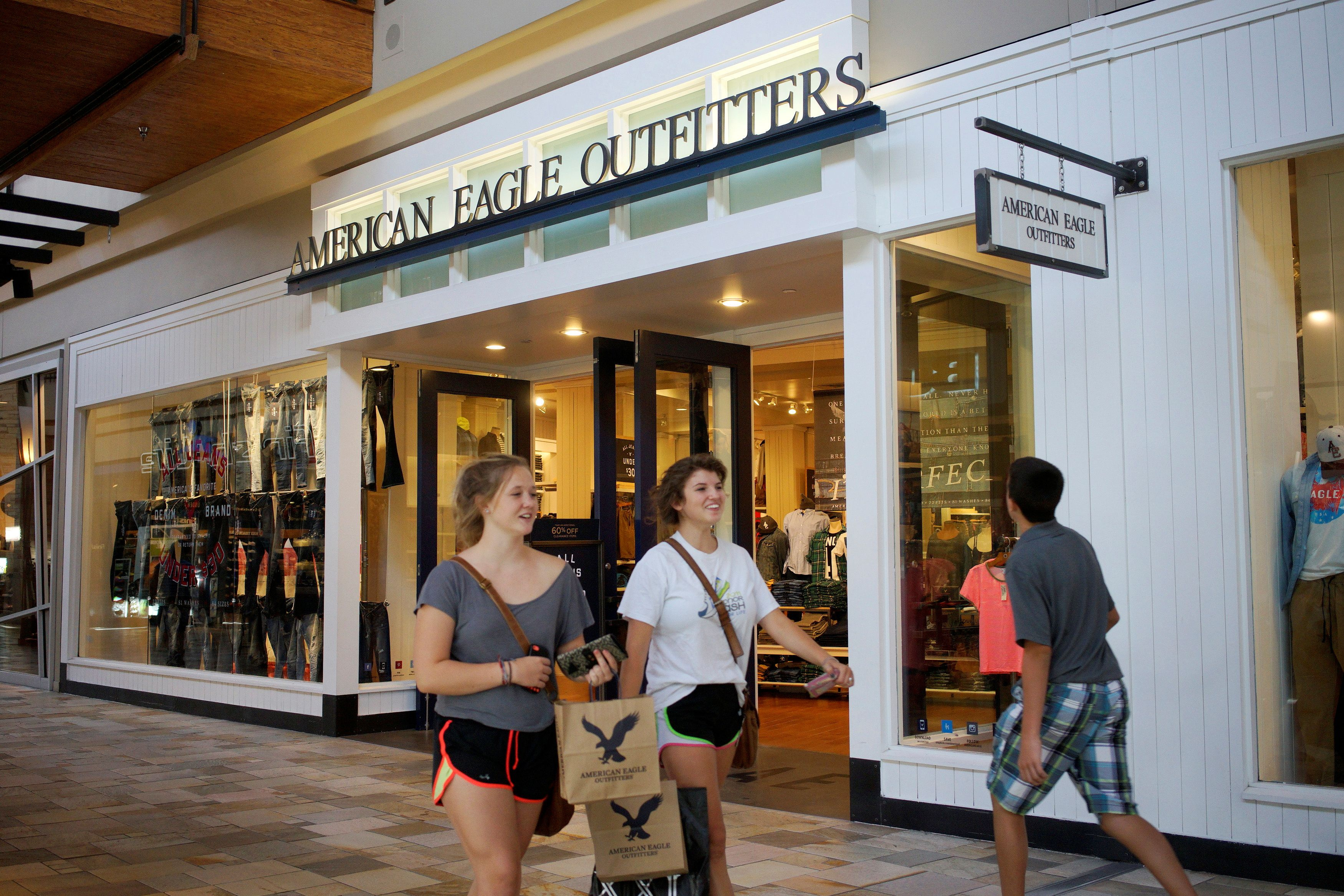 Shoppers leave the American Eagle Outfitters store in Broomfield