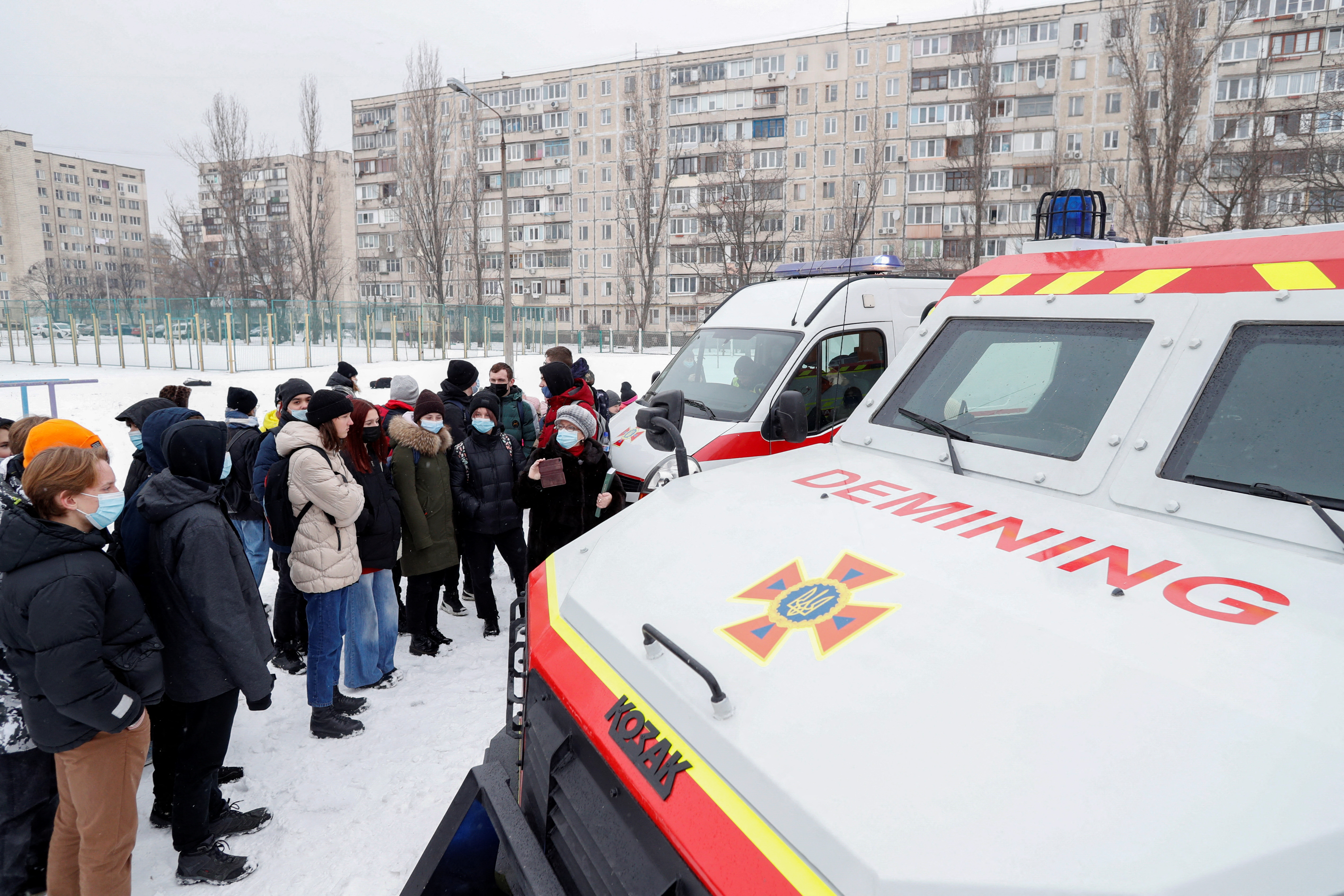 Schoolchildren attend bomb threat training at a public school in Kyiv
