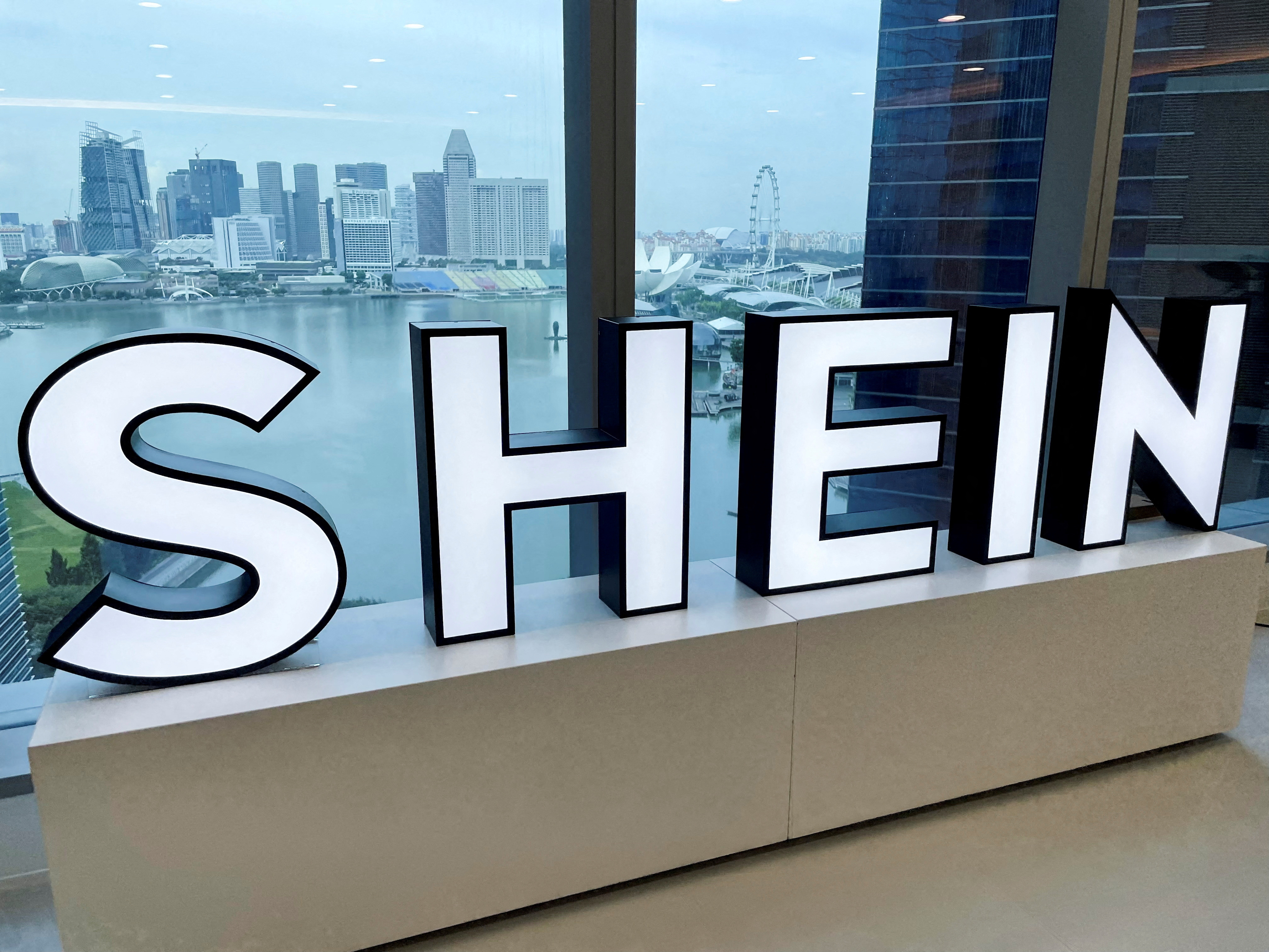 A Shein logo is pictured at the company's office in the central business district of Singapore