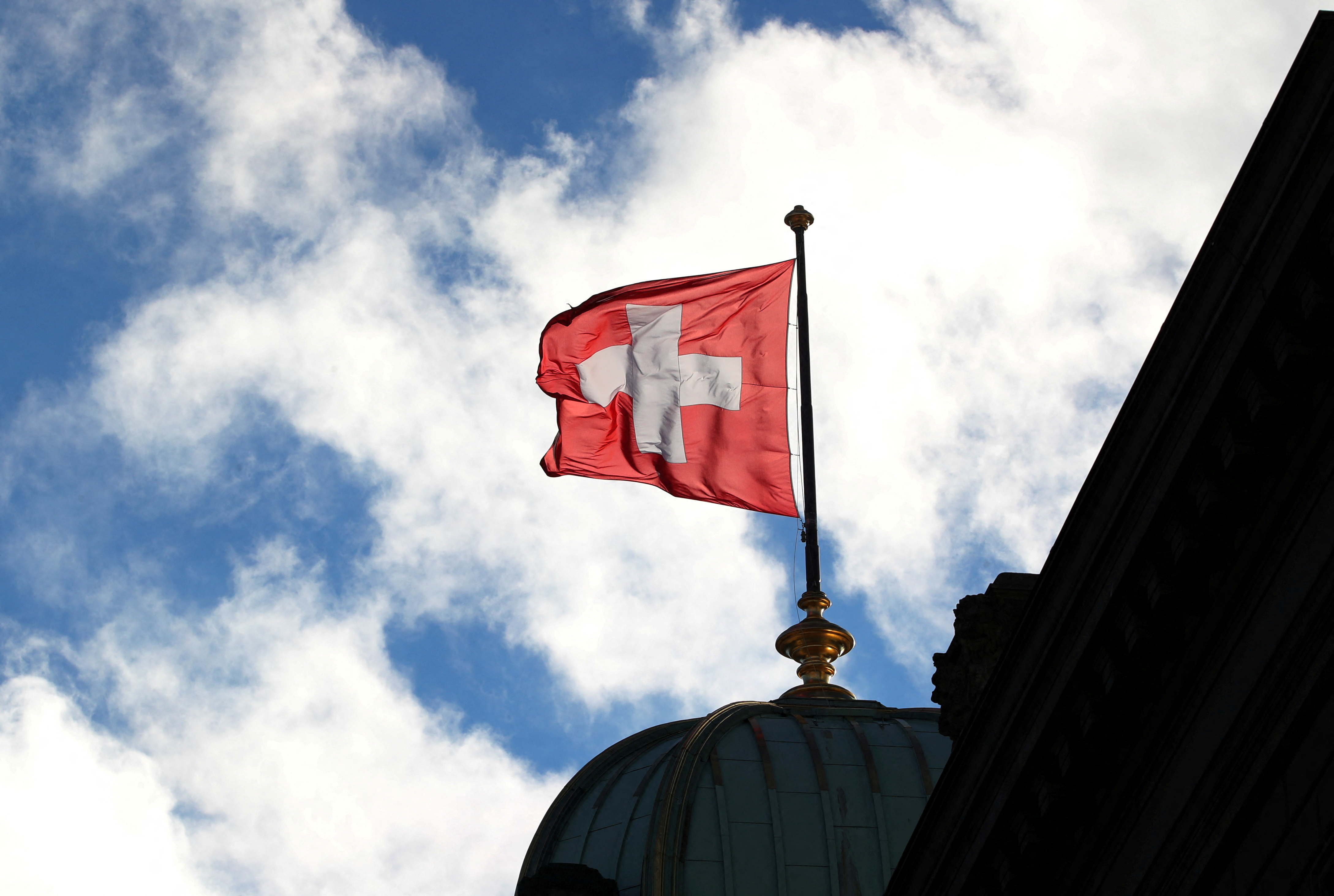 A Swiss flag is pictured on the Federal Palace in Bern