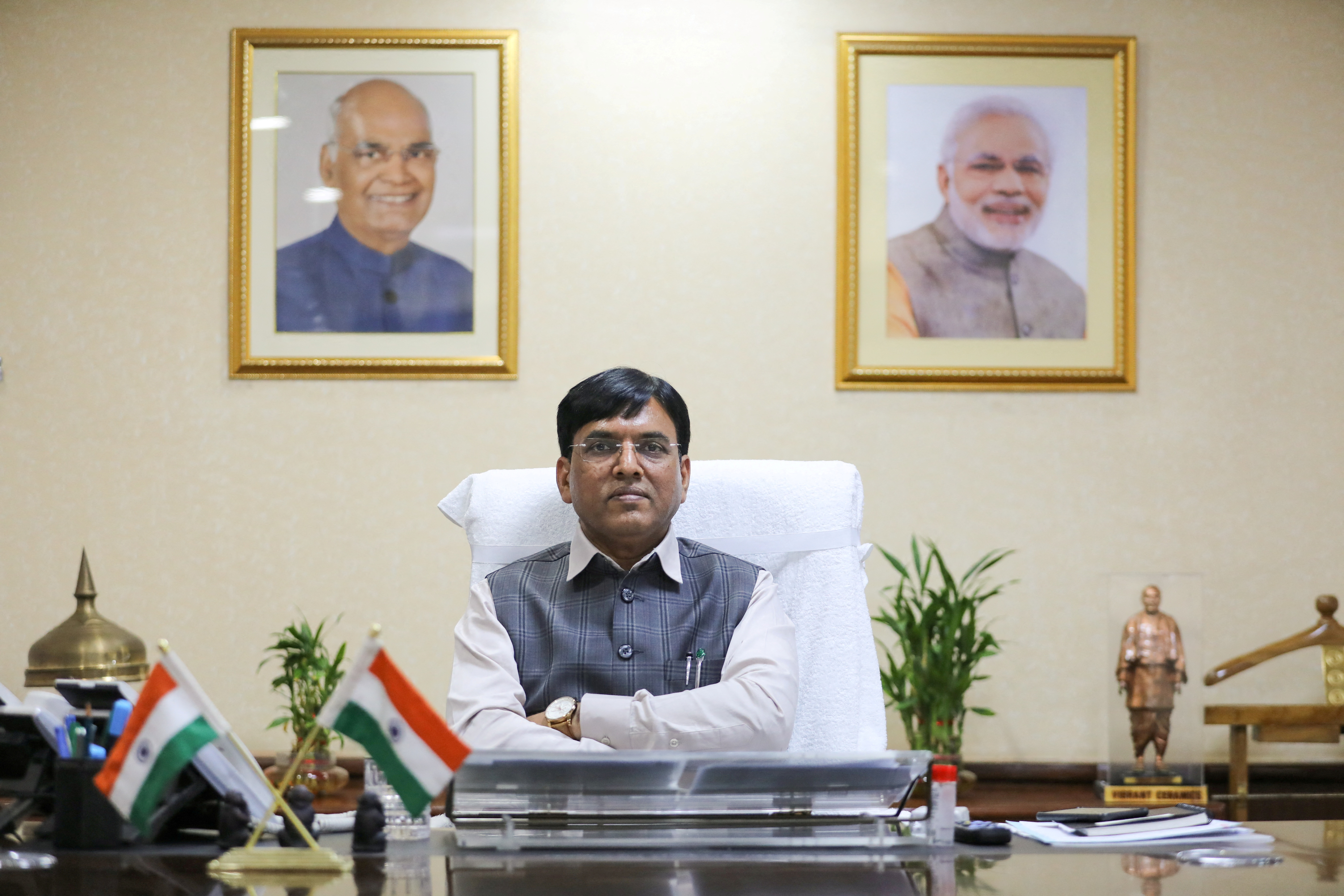 Shipping Minister Mansukh Mandaviya poses for a picture after his interview with Reuters, in New Delhi