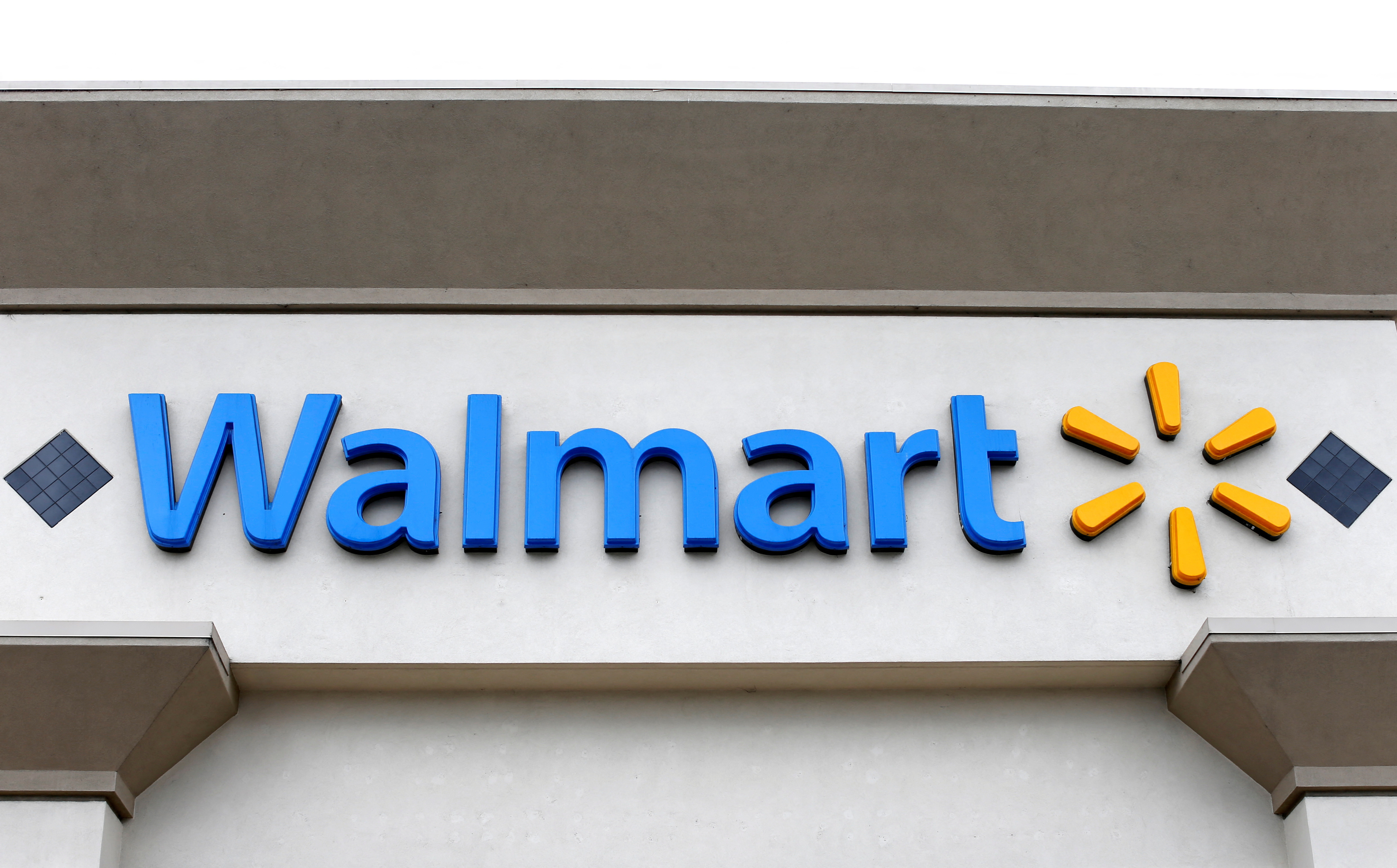 The logo of Down Jones Industrial Average stock market index listed company Walmart