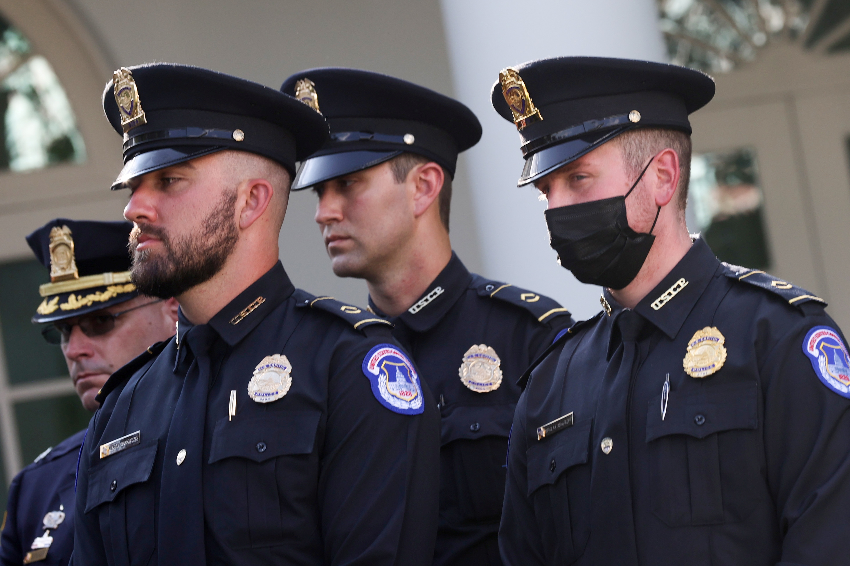 Biden Signs Law Honoring Officers Who Fought Us Capitol Attackers Reuters 