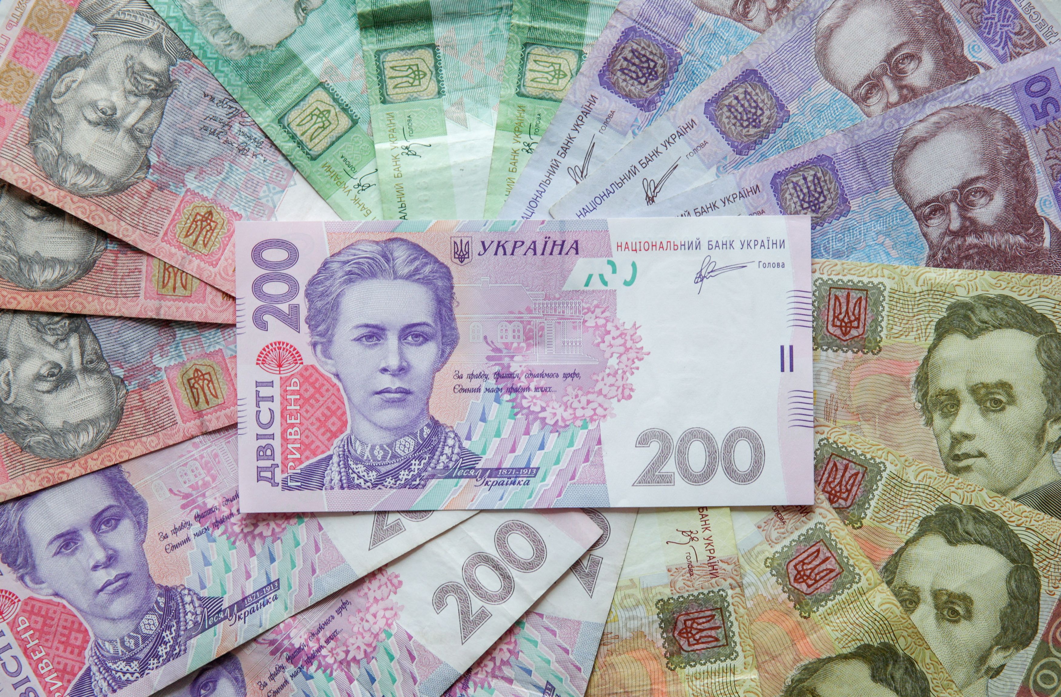 Ukrainian hryvnia banknotes are seen in a photo illustration shot in Kiev