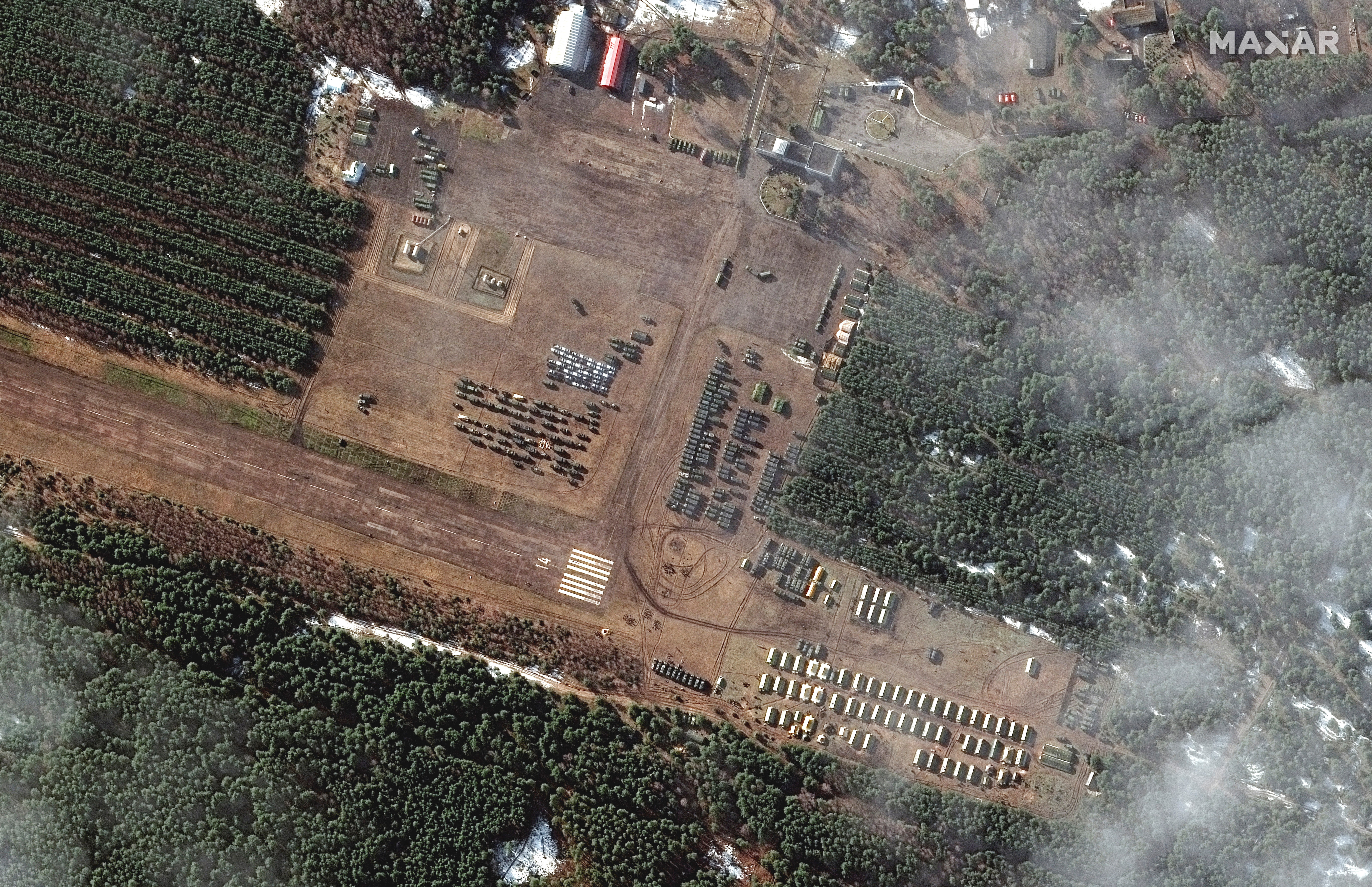 A satellite image shows an overview of a new deployment at V D Bolshoy Bokov airfield, near Mazyr, Belarus, February 22, 2022. Courtesy of Satellite image ©2022 Maxar Technologies/Handout via REUTERS 