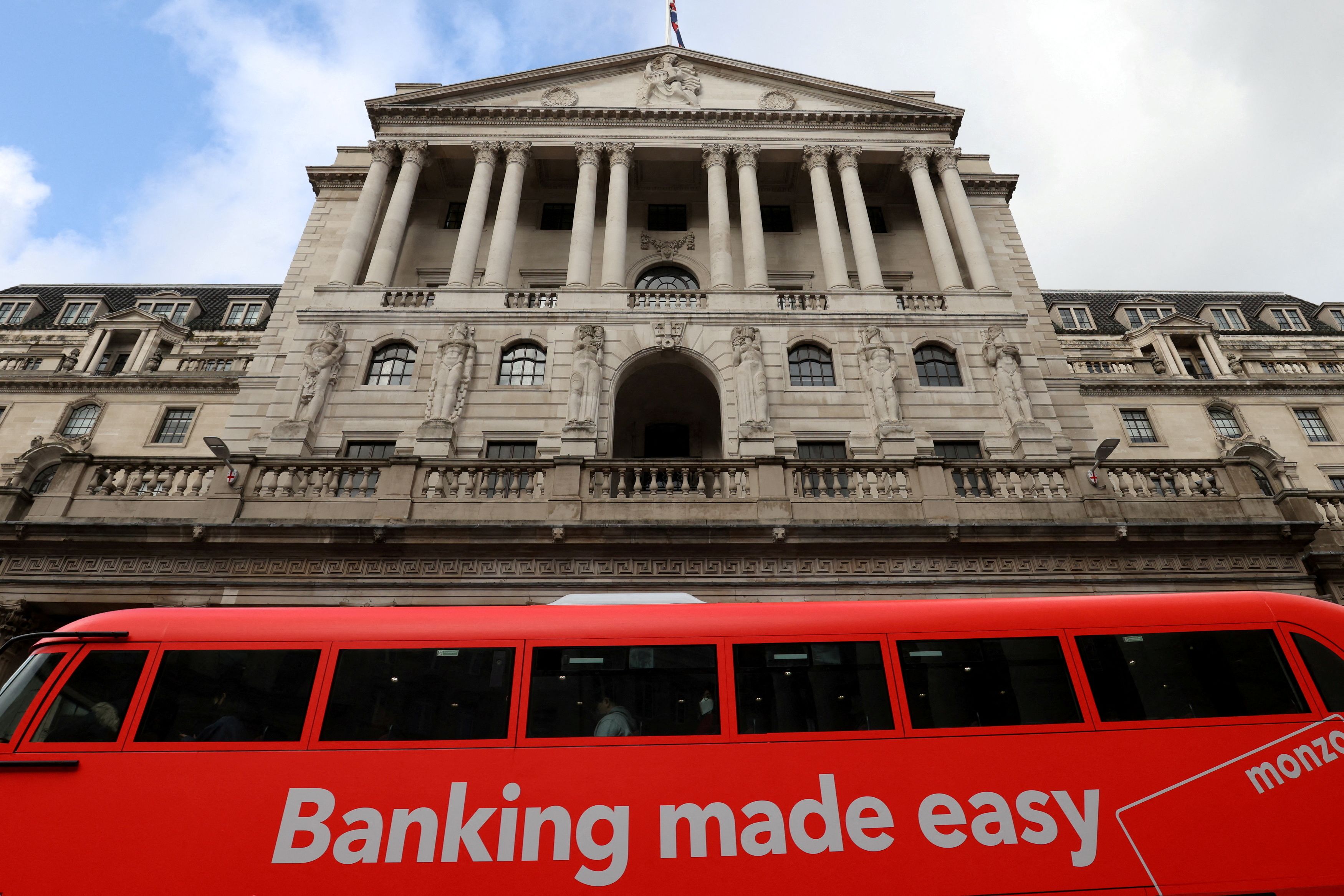 A bus passes in front of the Bank of England, in London