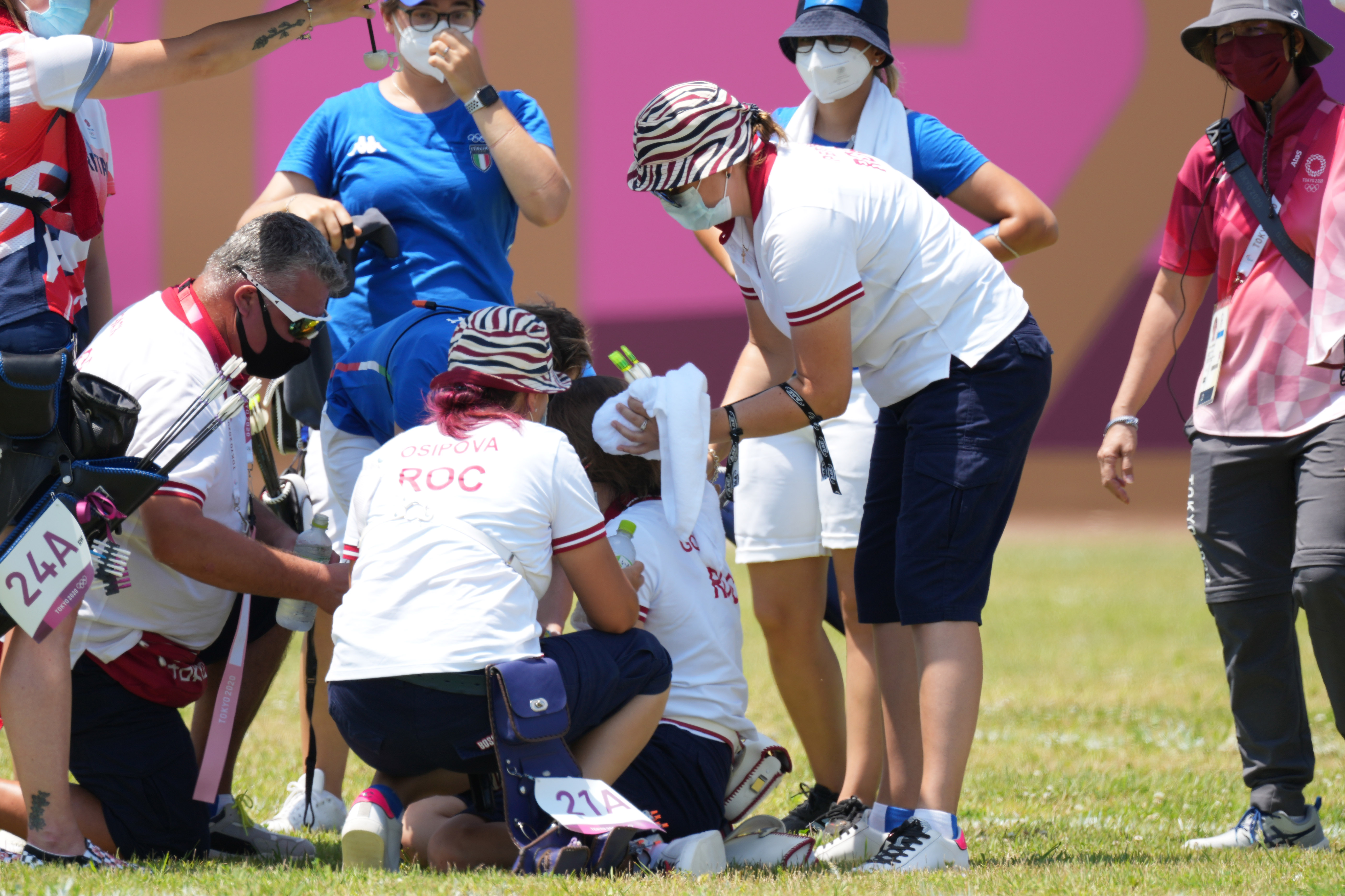 Jul 23, 2021; Tokyo, Japan;  Svetlana Gomboeva (ROC) is treated for heat exhaustion after completion of the archery ranking round during the Tokyo 2020 Olympic Summer Games at Yumenoshima Archery Field. Mandatory Credit: Jack Gruber-USA TODAY Network