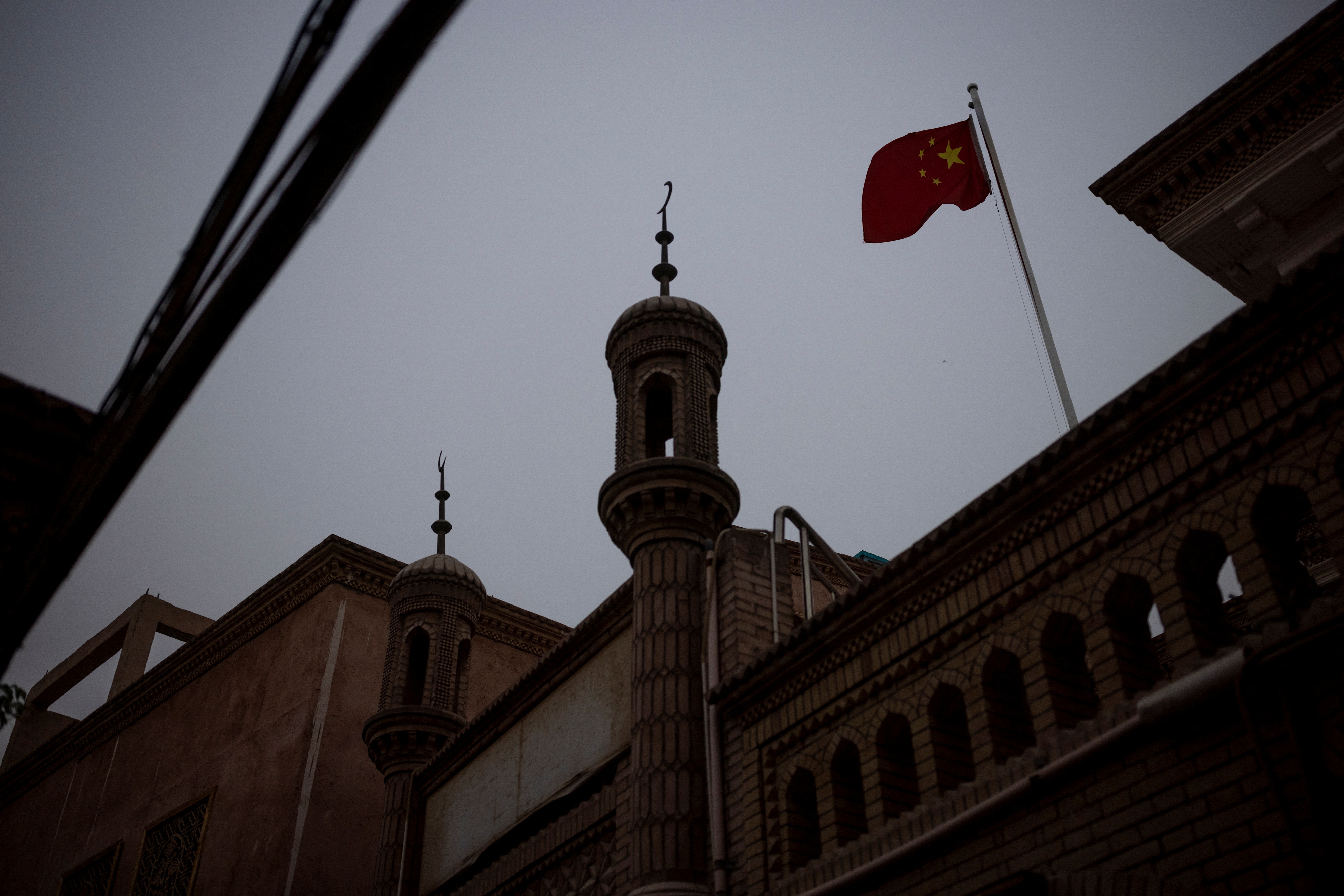The Wider Image: In China's new Xinjiang: patriotic tourism, police and propaganda
