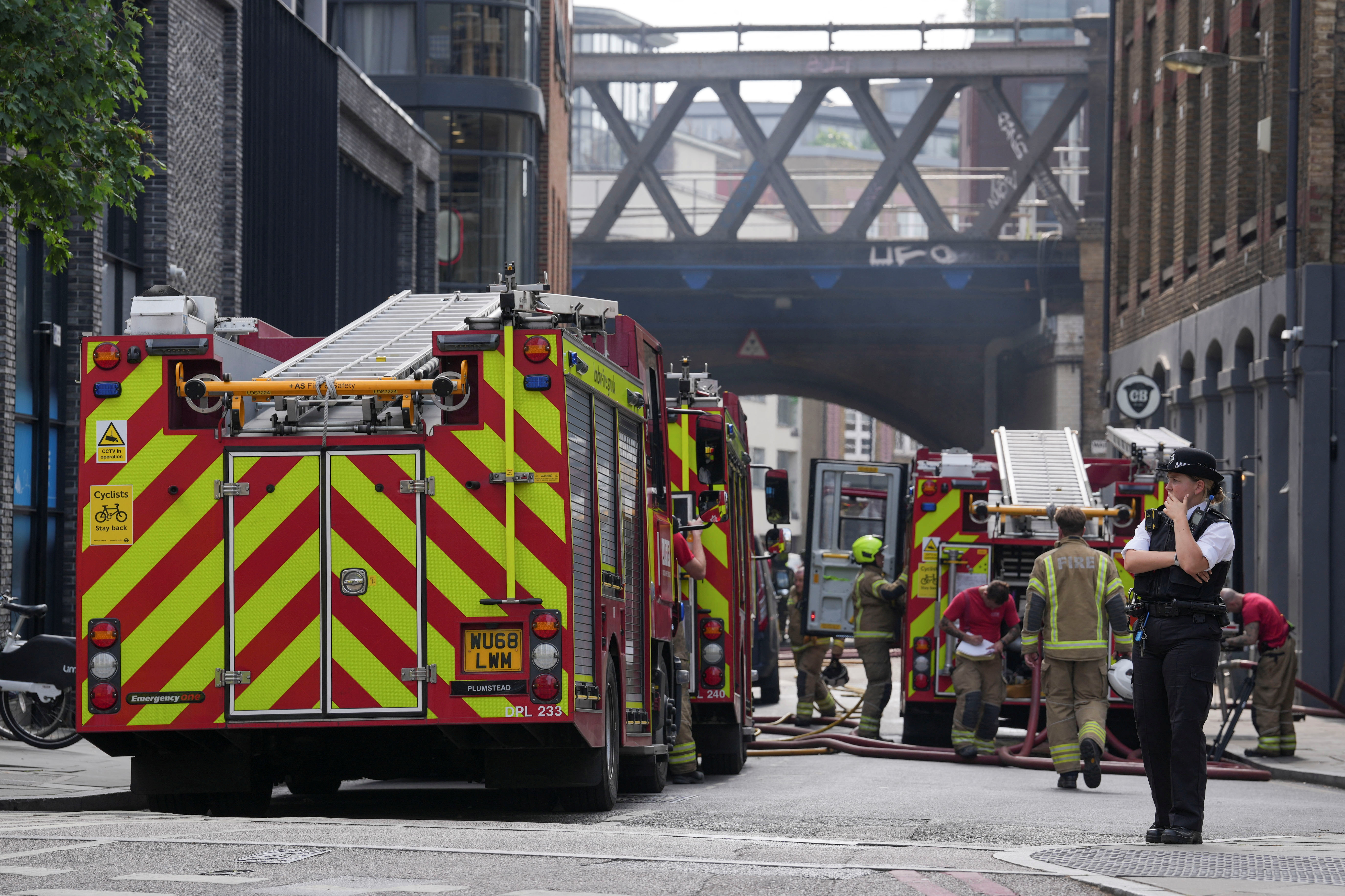 Fire breaks out in a railway arch, in London