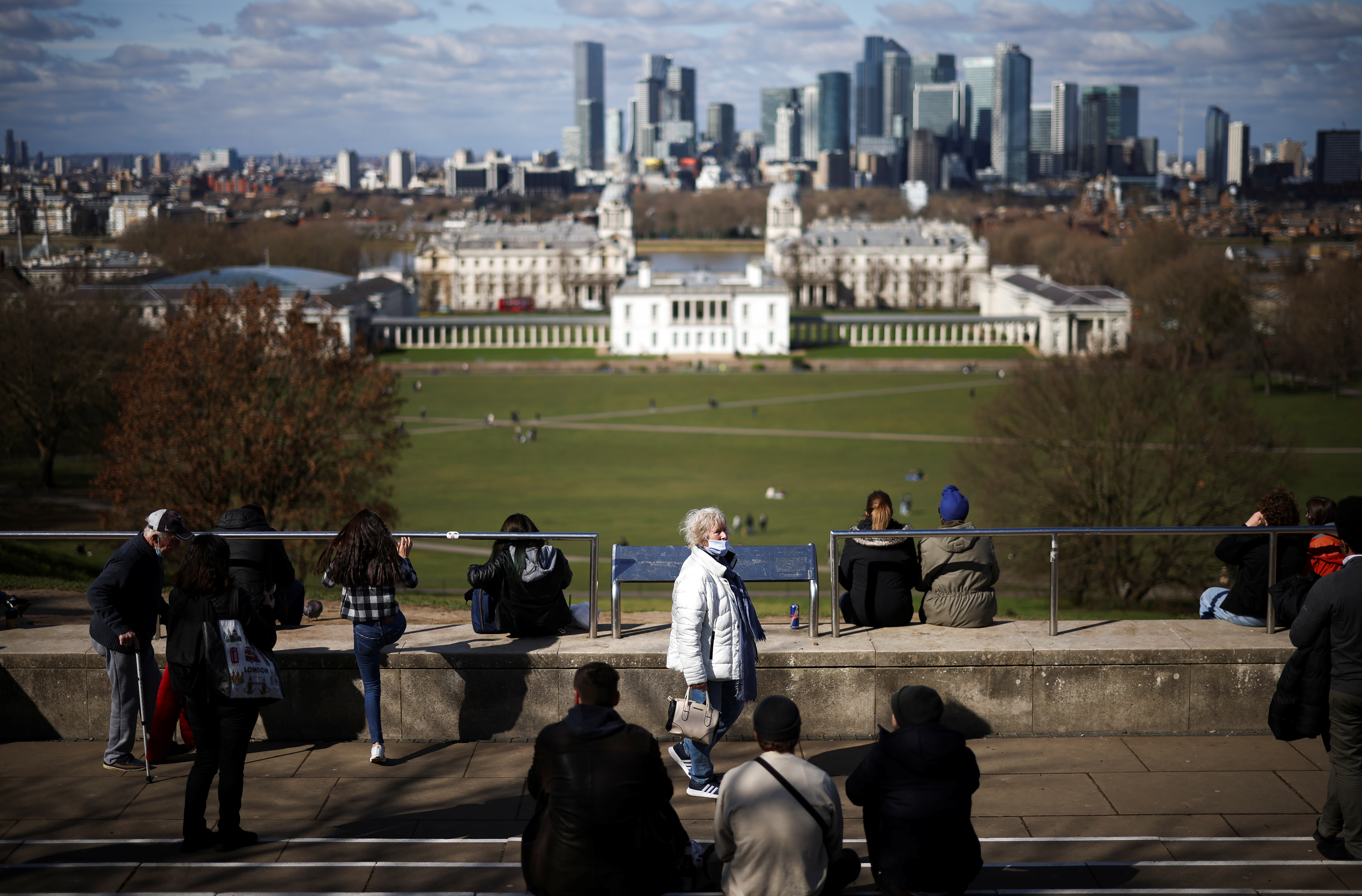 People gather at a viewpoint in Greenwich Park, amid the coronavirus disease (COVID-19) outbreak in London