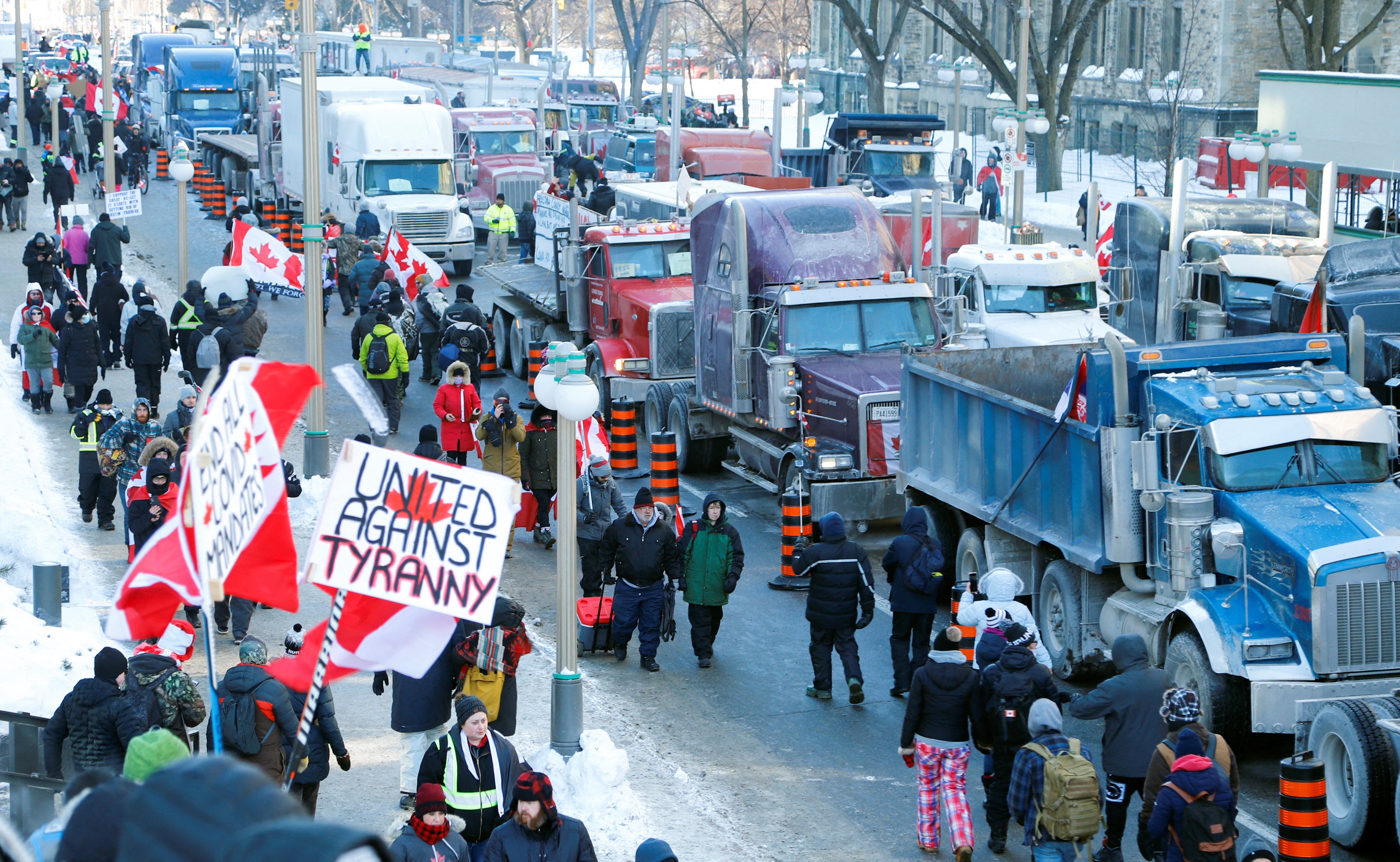 Truckers take part in a convoy and protest against COVID-19 vaccine mandate in Ottawa