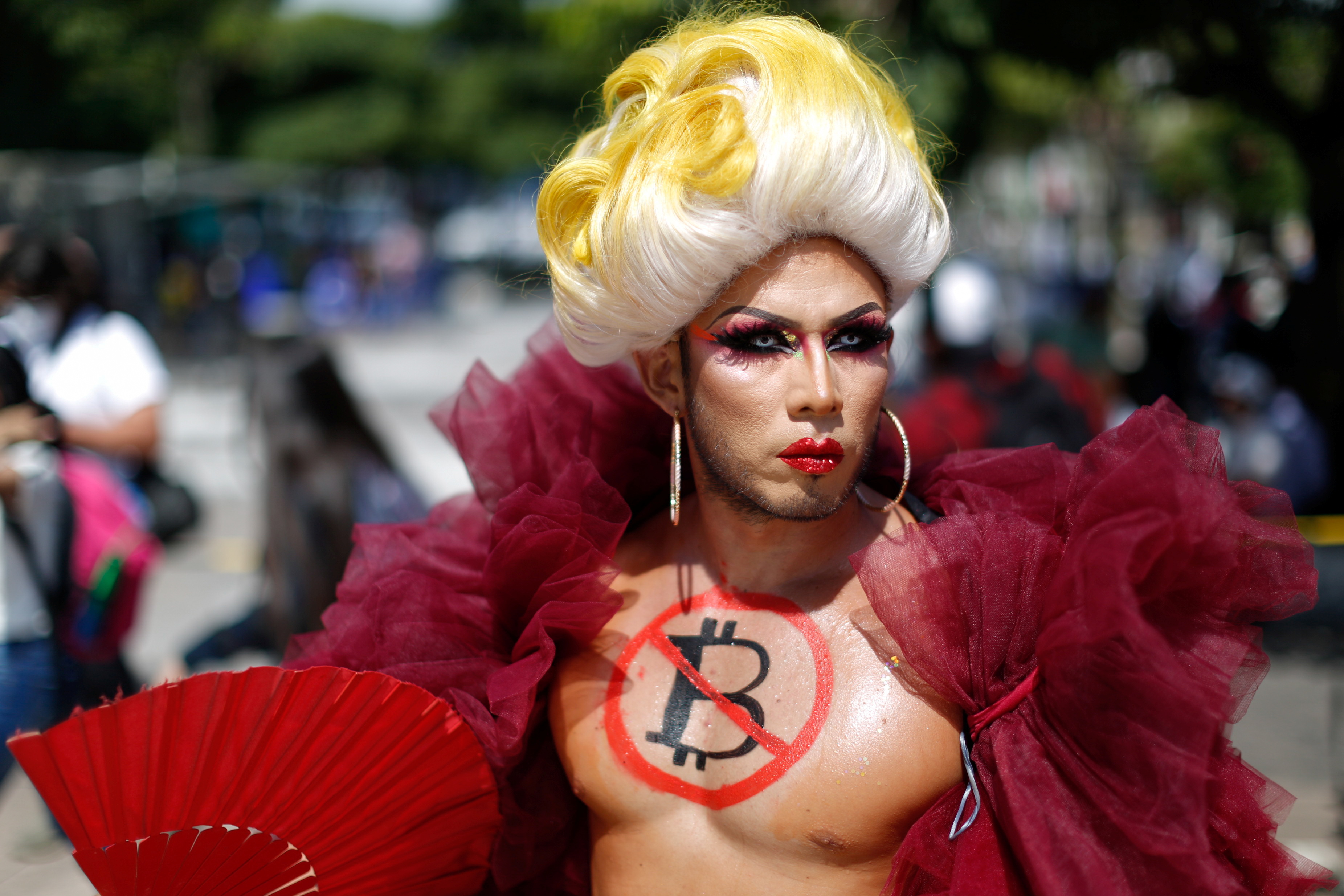 Salvador street protest breaks out against bitcoin adoption | Reuters