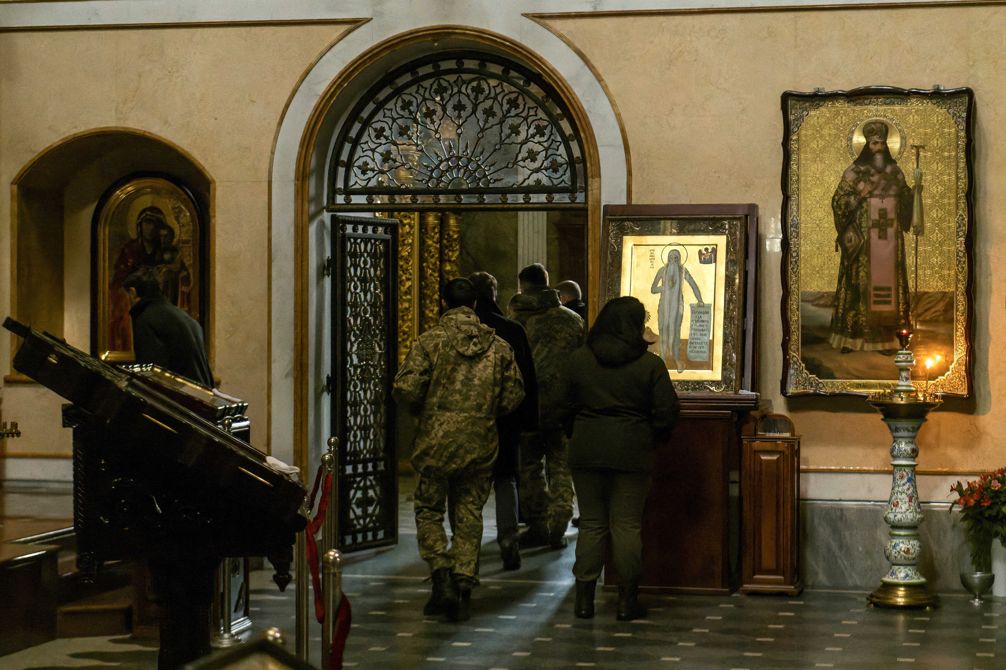 Ukrainian law enforcement officers inspect one of churches of the Kyiv Pechersk Lavra monastery in Kyiv