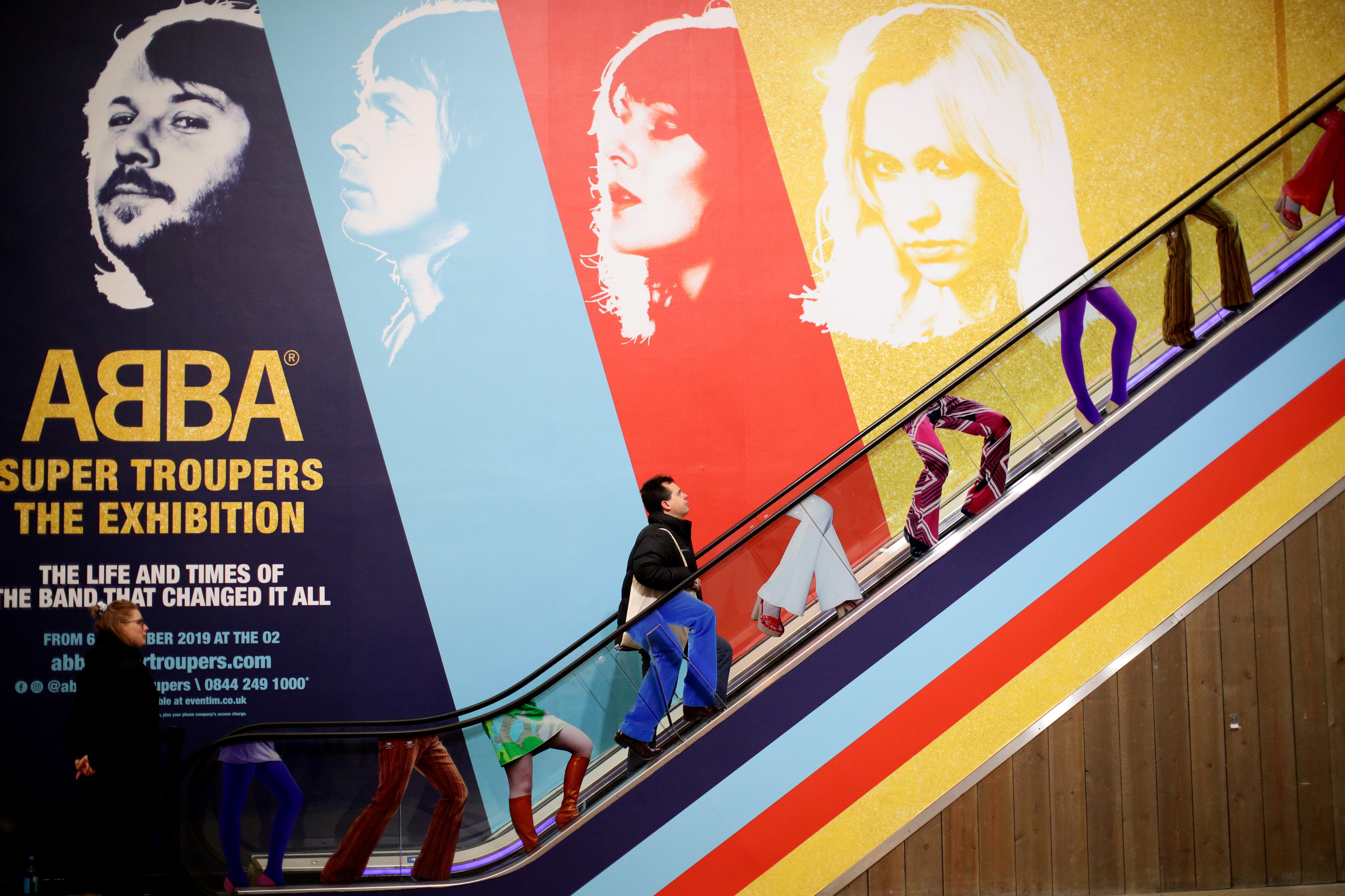 A visitor enters the ABBA: Super Troupers The Exhibition at the O2 in London, Britain, December 5, 2019. REUTERS/Lisi Niesner