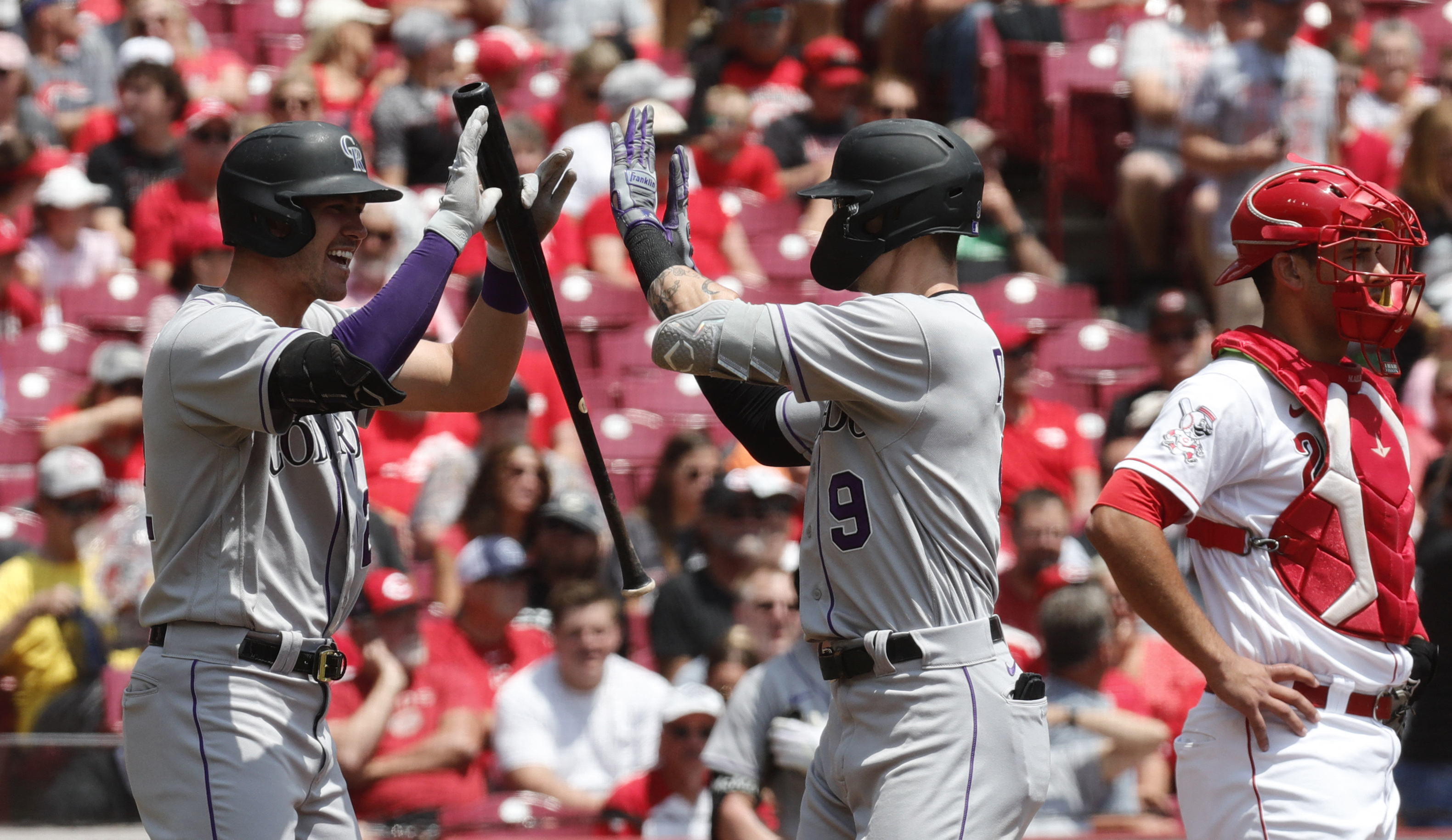 Rockies' three-game winning streak ends with loss to Reds in 12