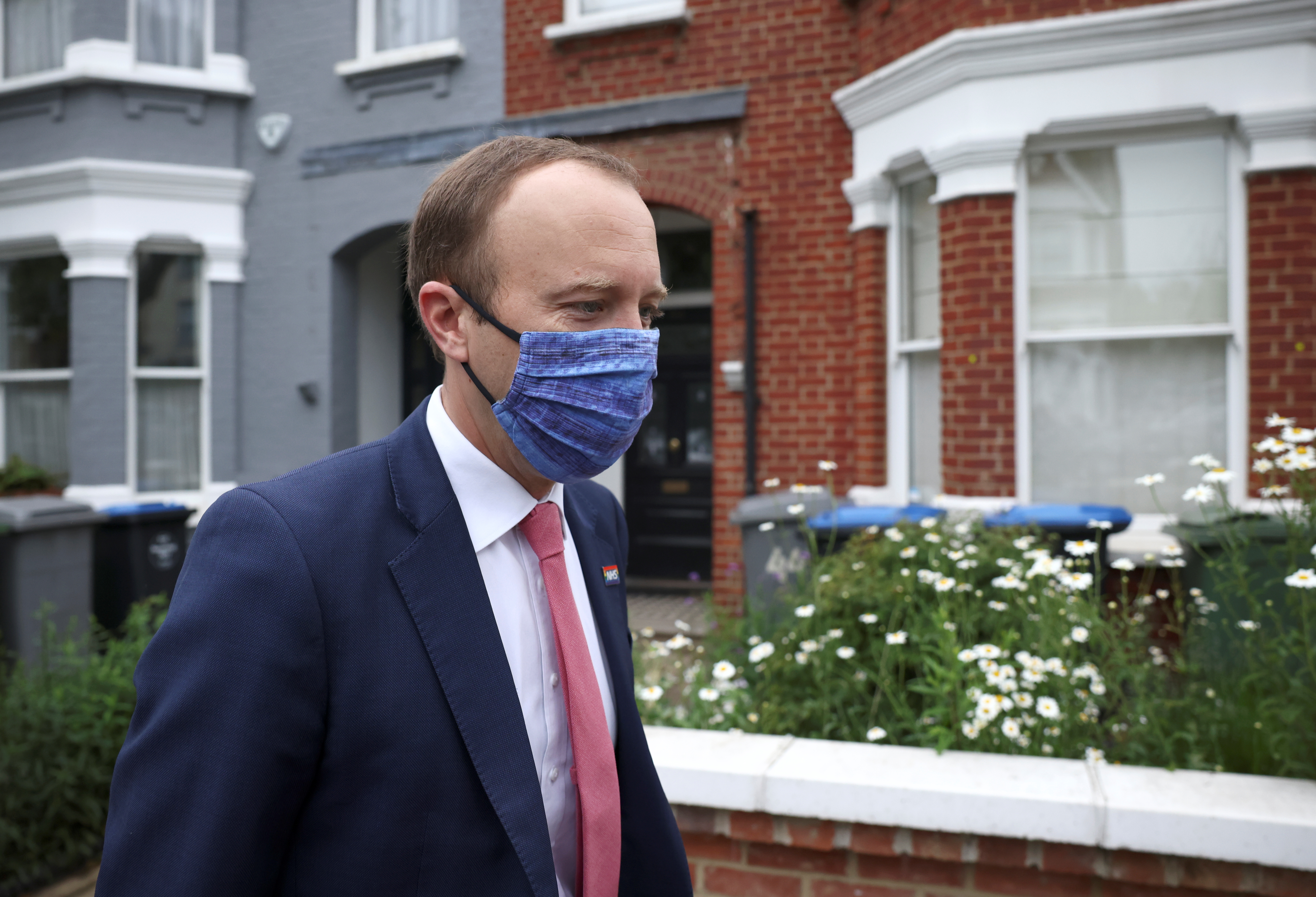 Britain's Health Secretary Matt Hancock leaves his house, in London