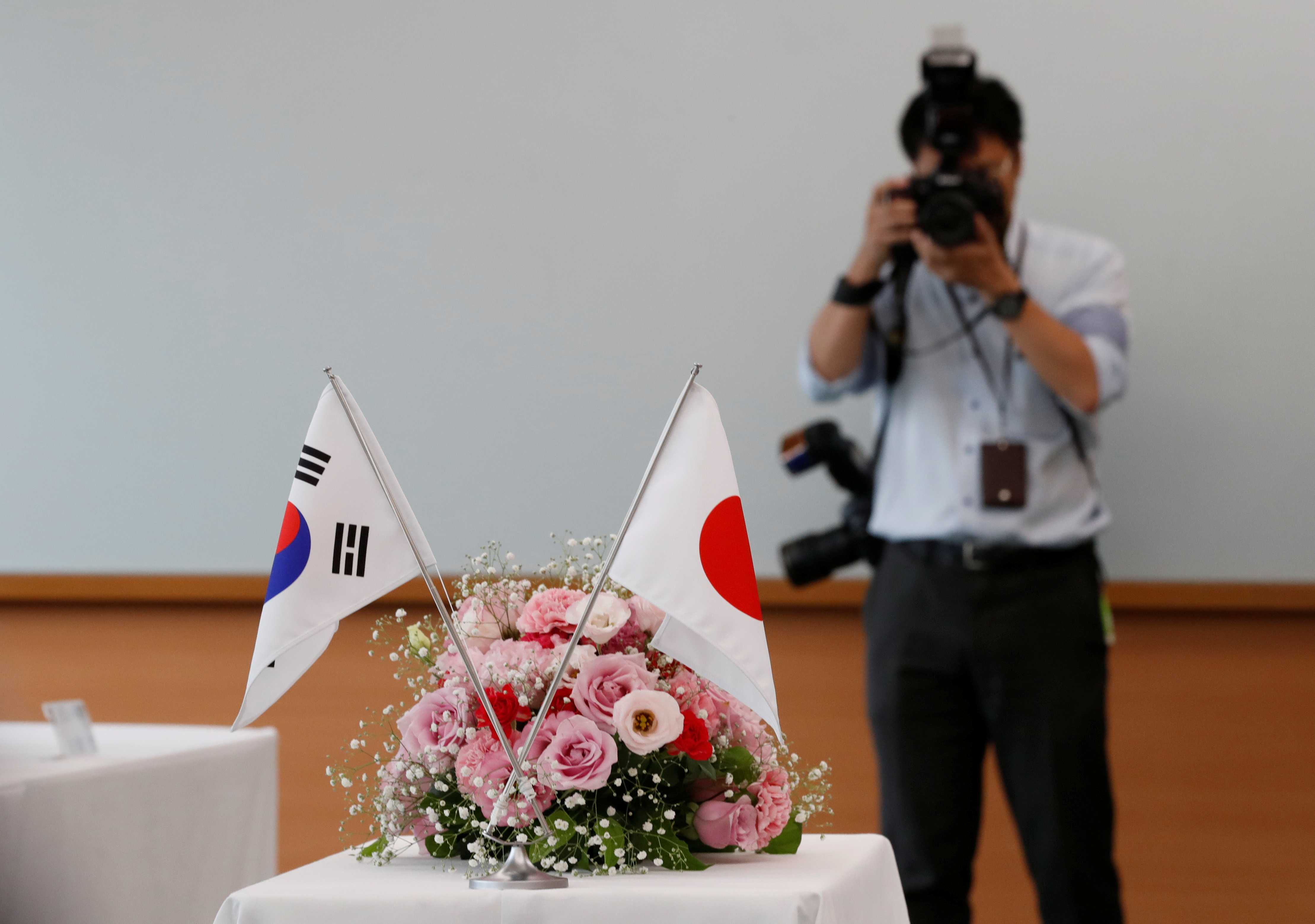 National flags of South Korea and Japan are displayed during a meeting between Komeito Party members and South Korean lawmakers at Komeito Party's headquarters in Tokyo
