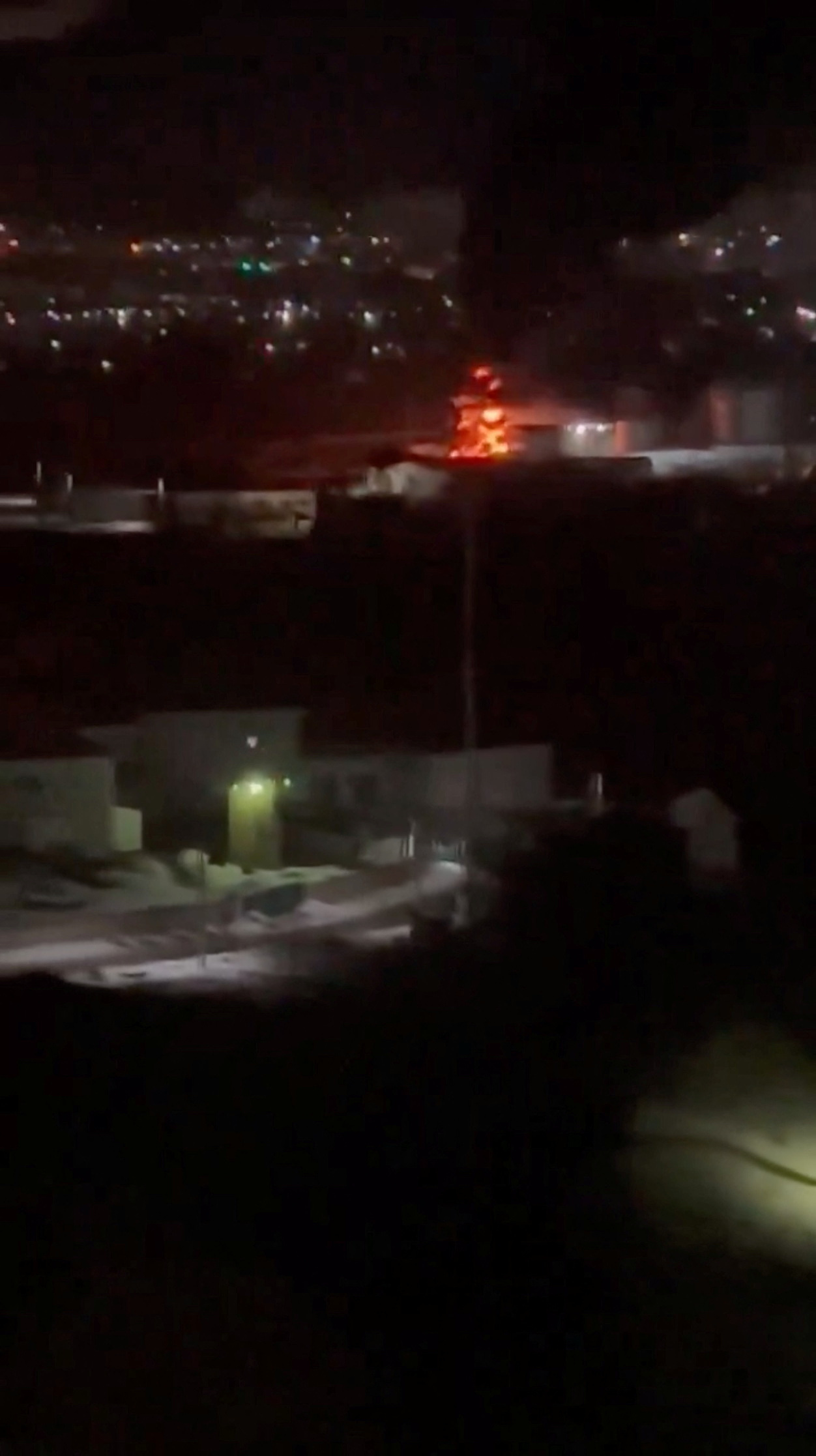A fire breaks out following a Ukrainian drone strike at an oil depot in Oryol