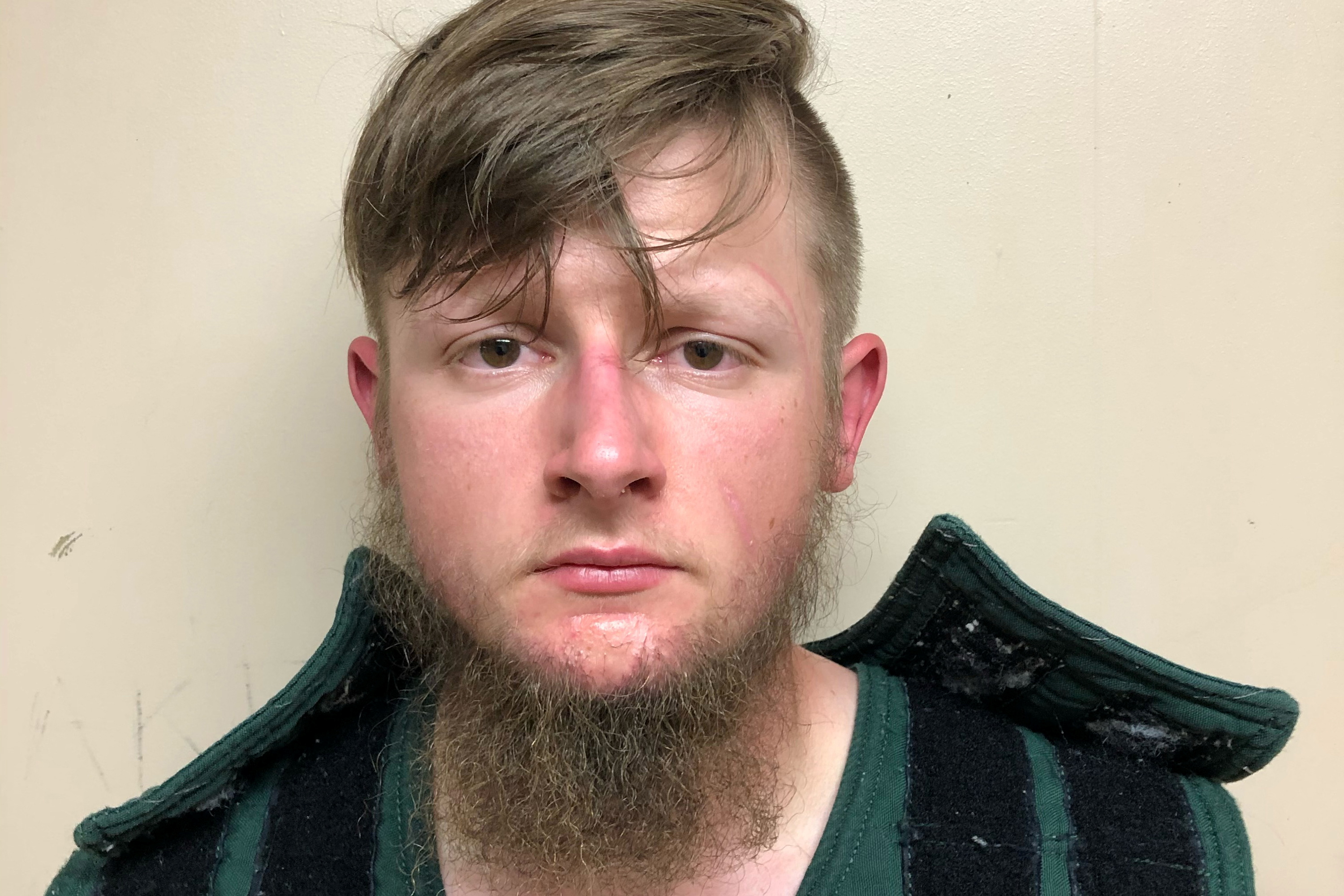 Robert Aaron Long, 21, poses in a jail booking photograph after he was taken into custody by the Crisp County Sheriff's Office in Cordele