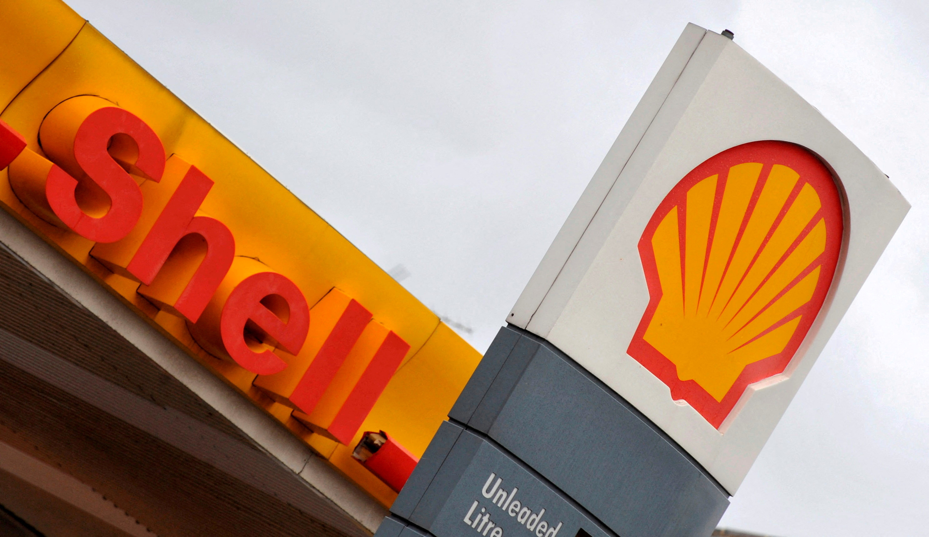 The Shell logo is seen at a Shell petrol station in London
