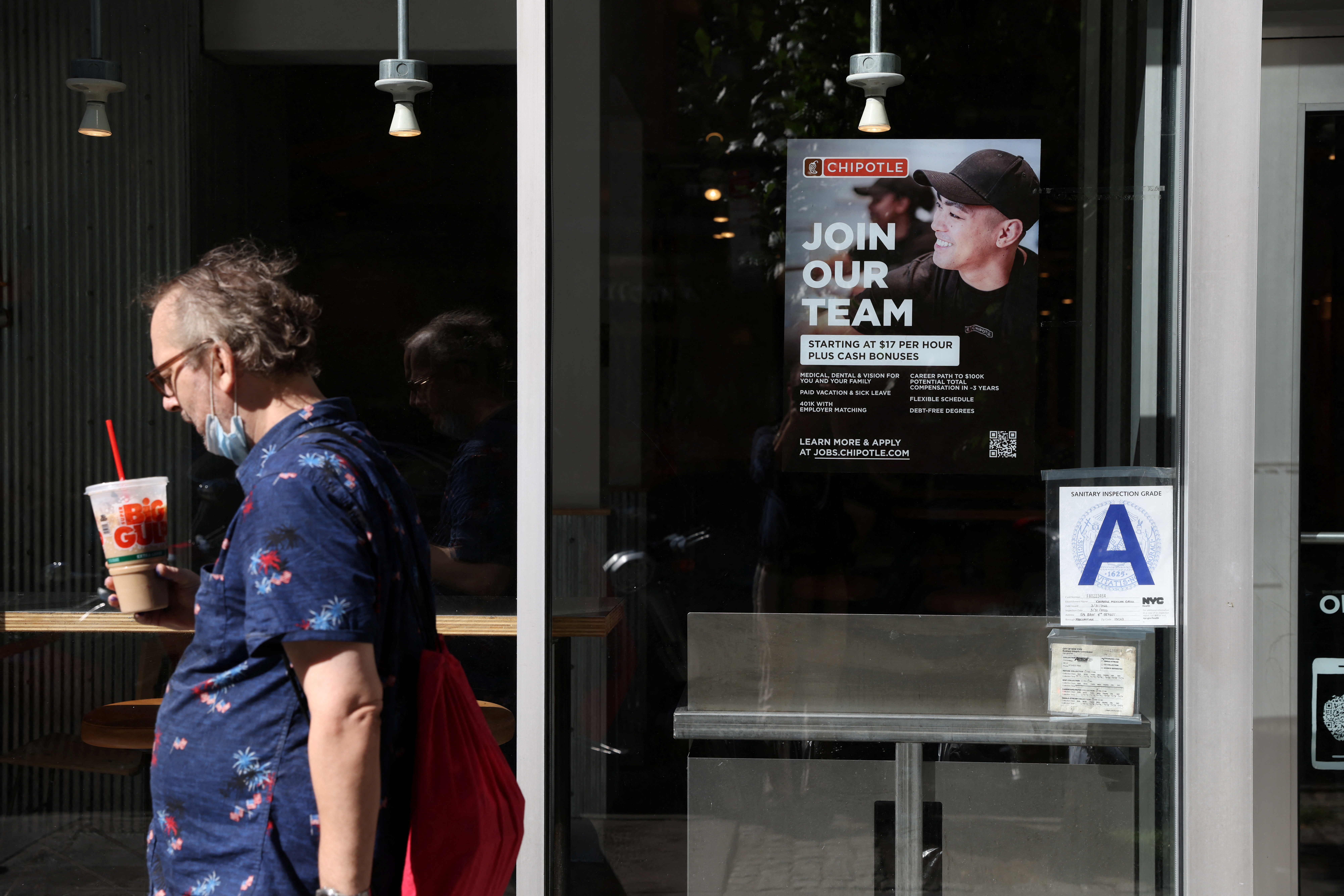 A hiring sign is seen in a restaurant as the U.S. Labor Department released its July employment report, in Manhattan, New York City