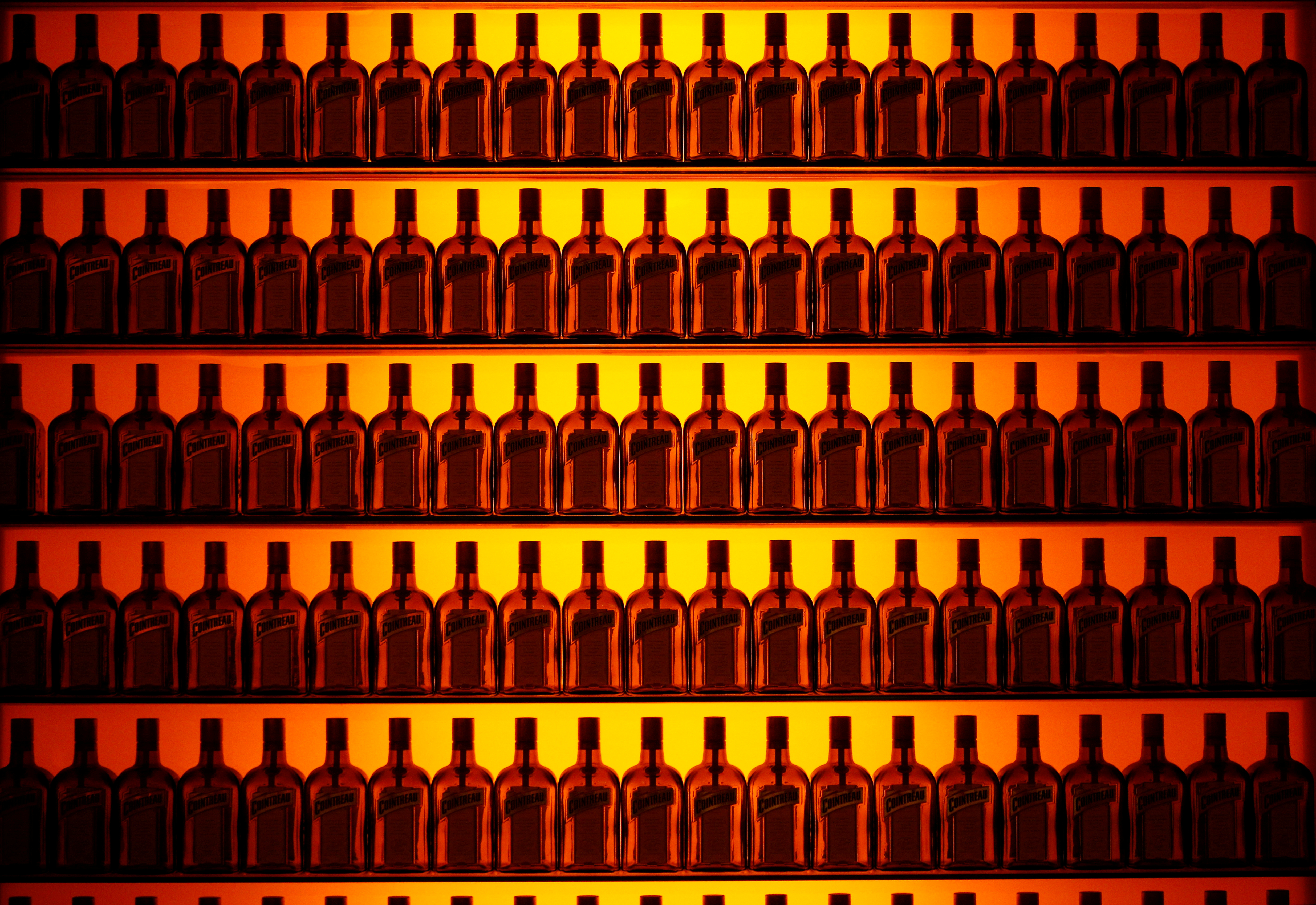 Bottles of Cointreau are displayed at the Carre Cointreau in the Cointreau distillery in Saint-Barthelemy-d'Anjou near Angers