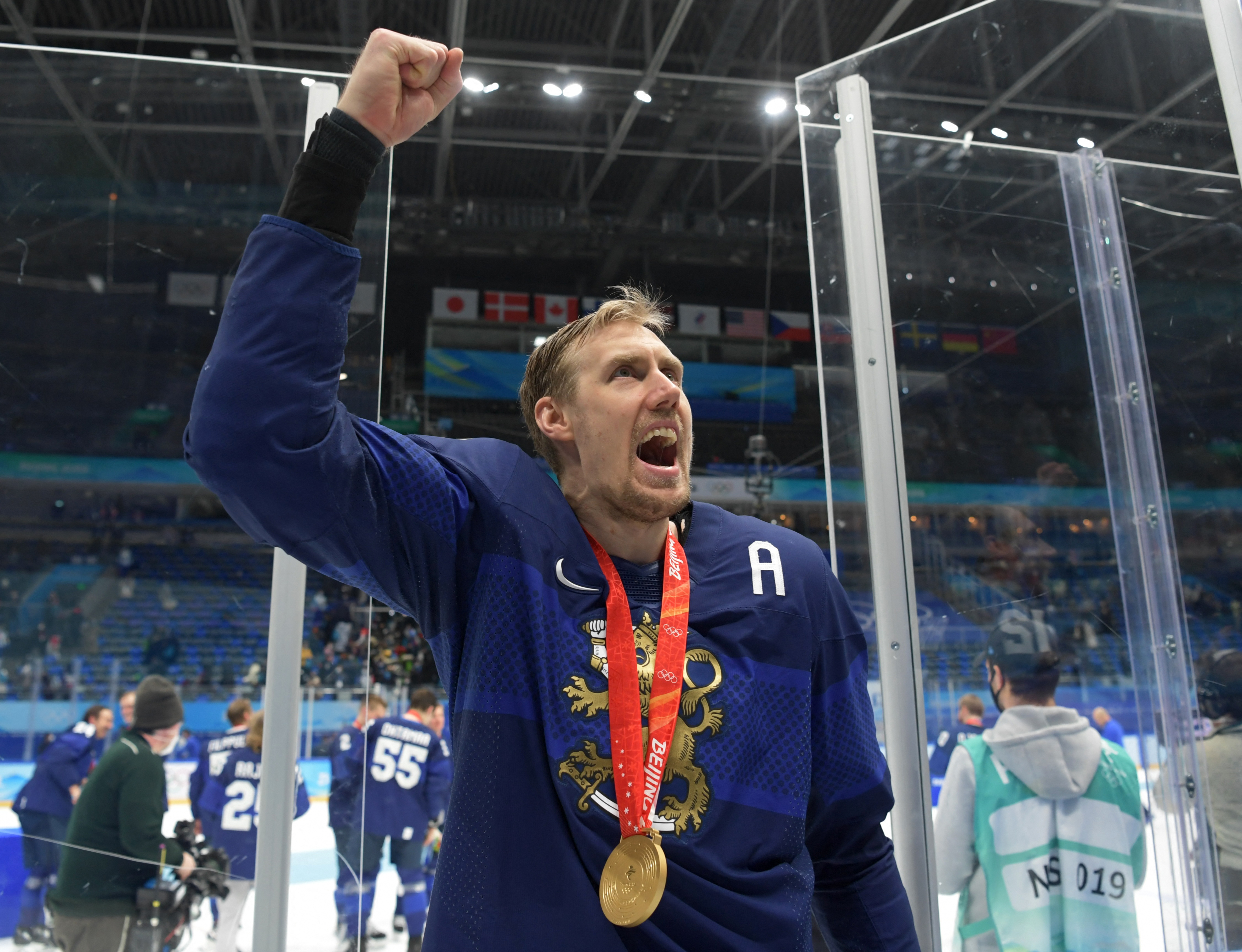Finland follows first Olympic hockey gold with world title; U.S.