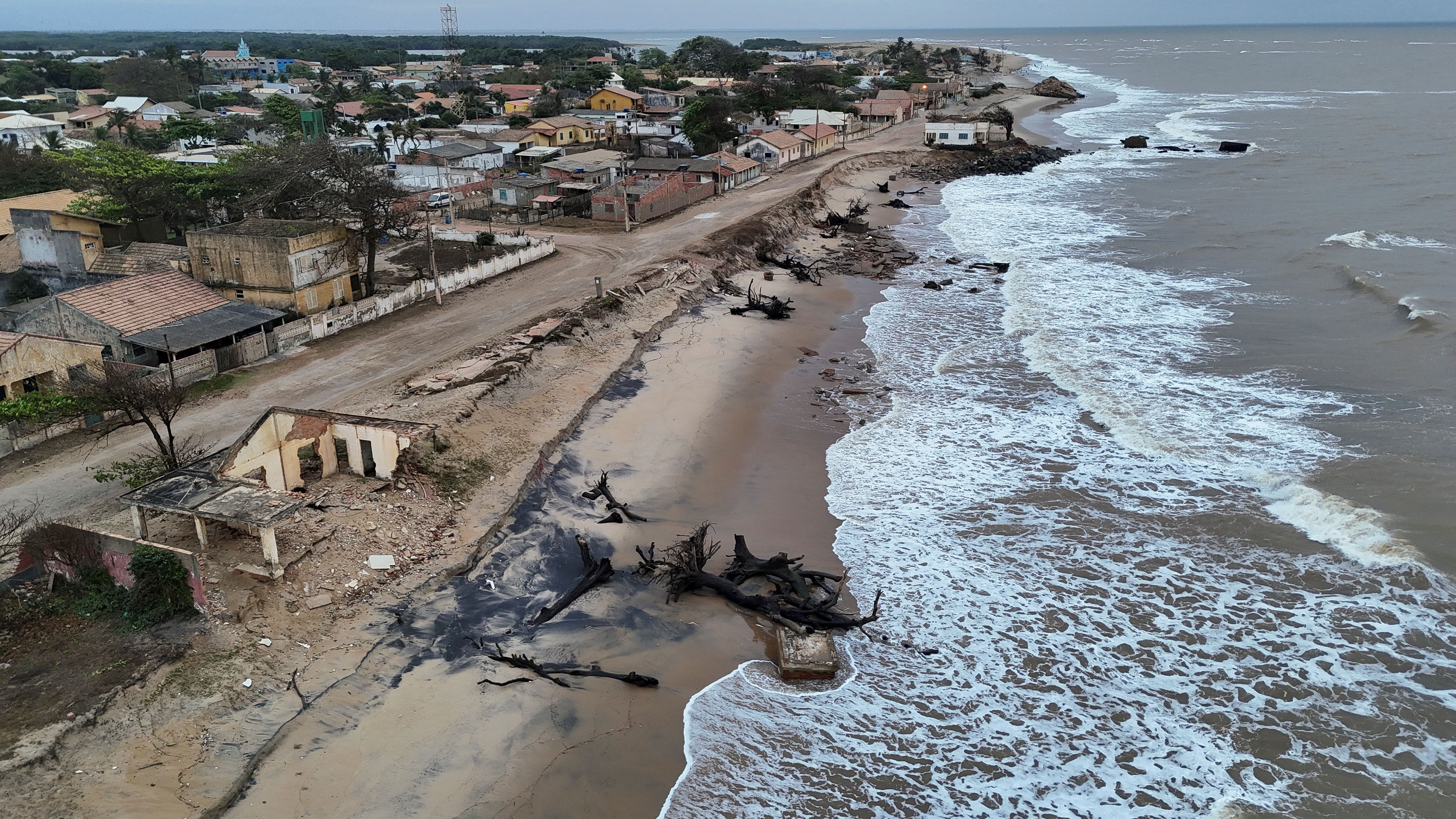 A drone view shows a destroyed house on the beach in Atafona, Rio de Janeiro state, Brazil, September 17, 2024. REUTERS/Ricardo Moraes