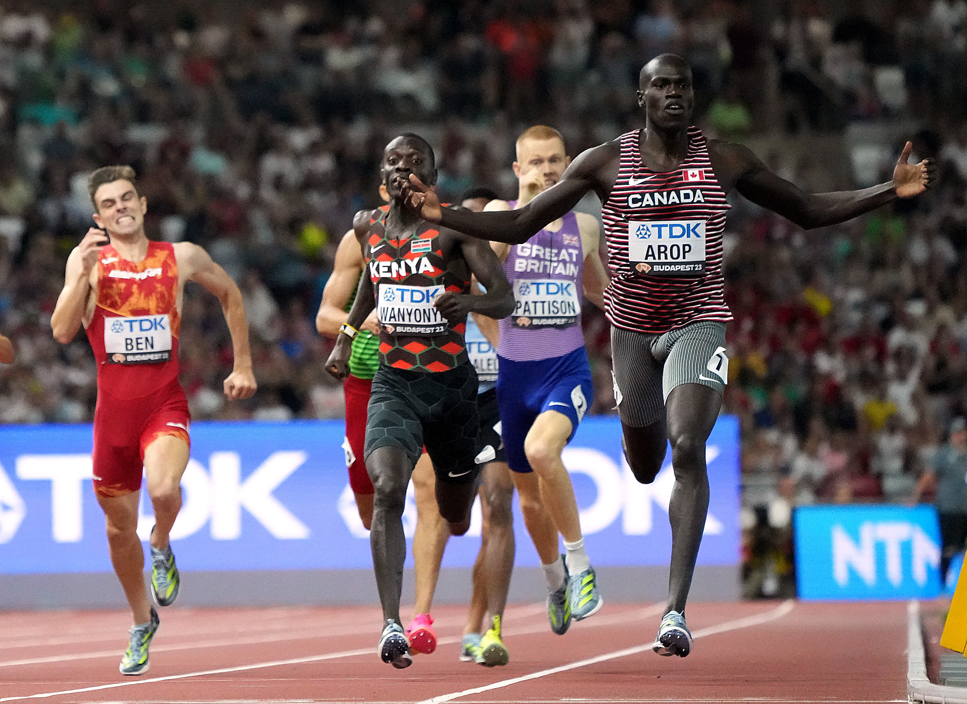 Canada's Arop goes from back to front to take 800m gold