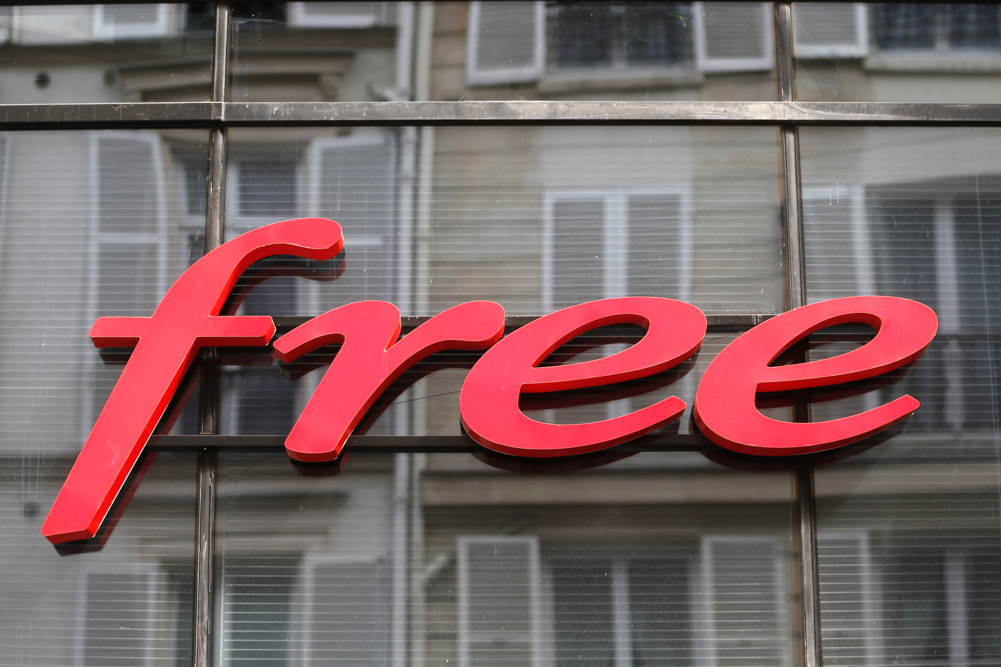 The logo of French internet service provider and mobile phone operator Free is seen at the company headquarters in Paris